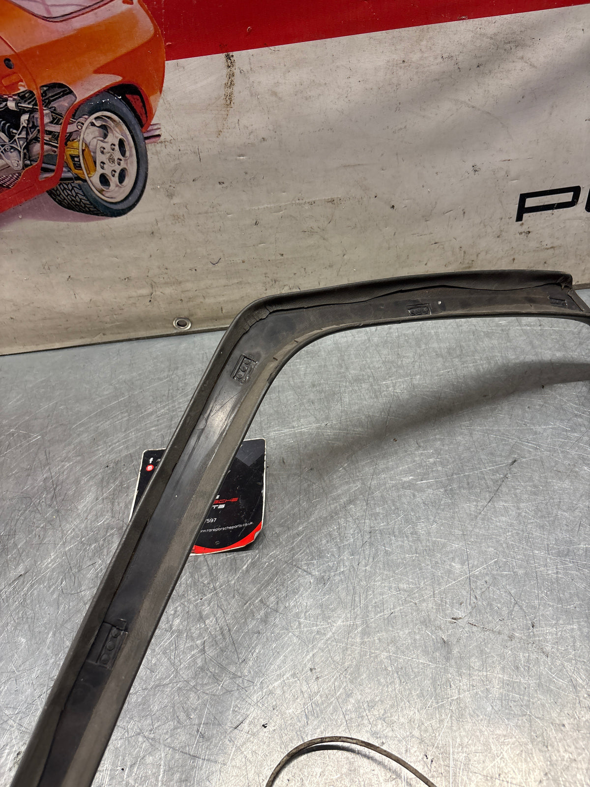 Porsche 928 left, off side door upper frame surround trim, grey 92855502502, used
