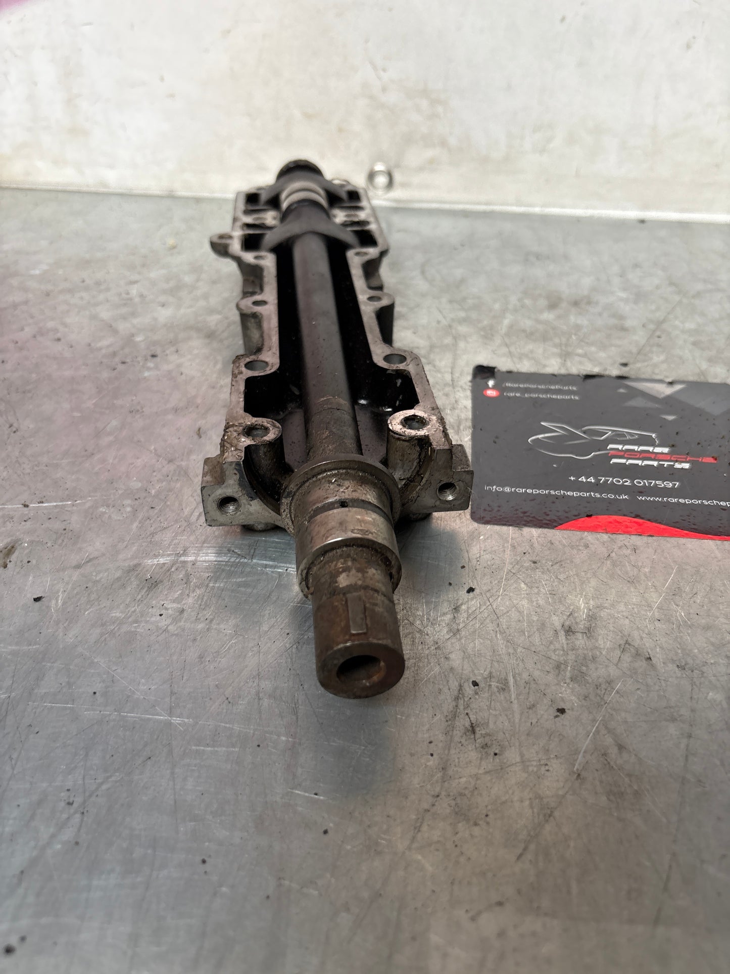 Porsche 944 Balance shaft, with housing, used 9441011057R