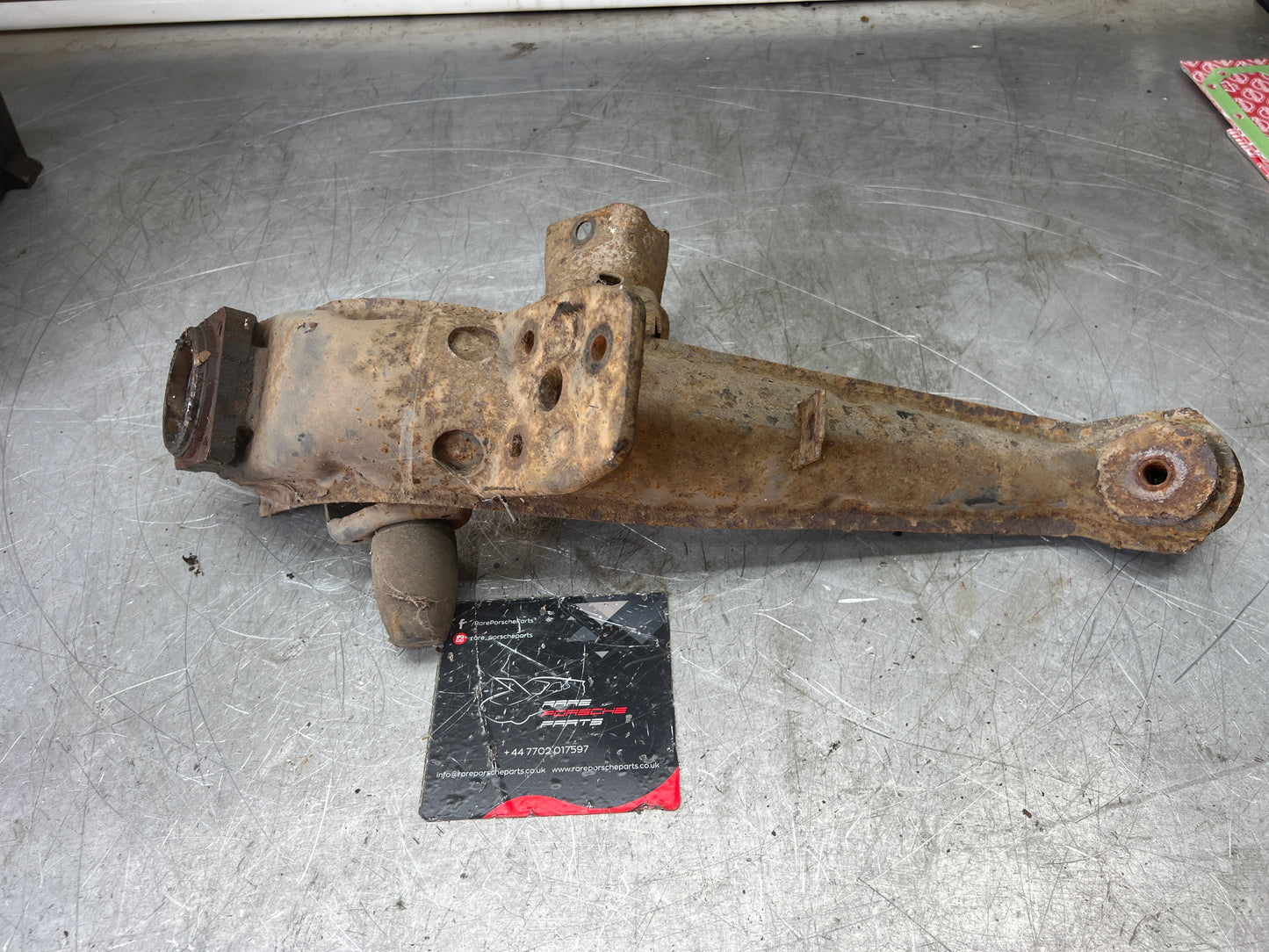 Porsche 924 944  -85.5 Rear left trailing arm, 94433102100