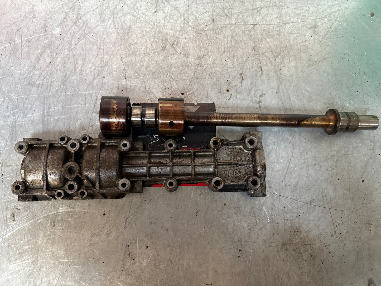 Porsche 924 2.5 / 944 Balance shaft, with housing, used 9441011080R