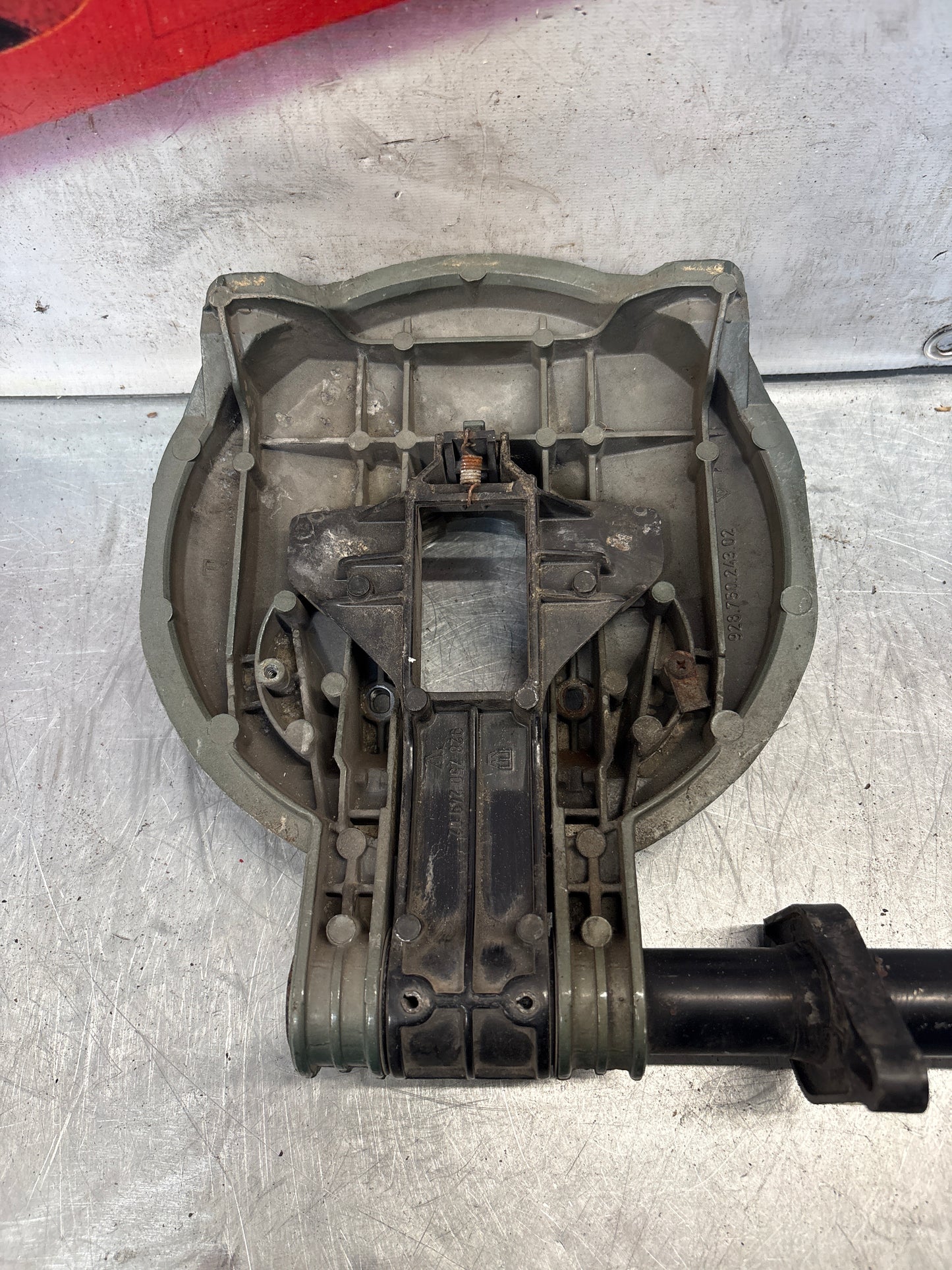 Porsche 928 right headlight swivel frame 92875024902 92875024302 used