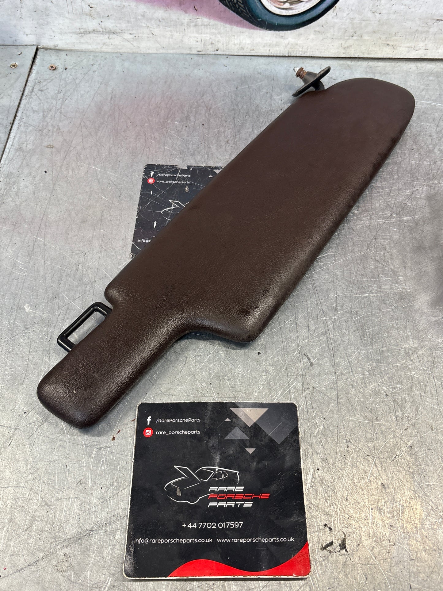 Porsche 928 burgundy sun visor, used left 92873123702