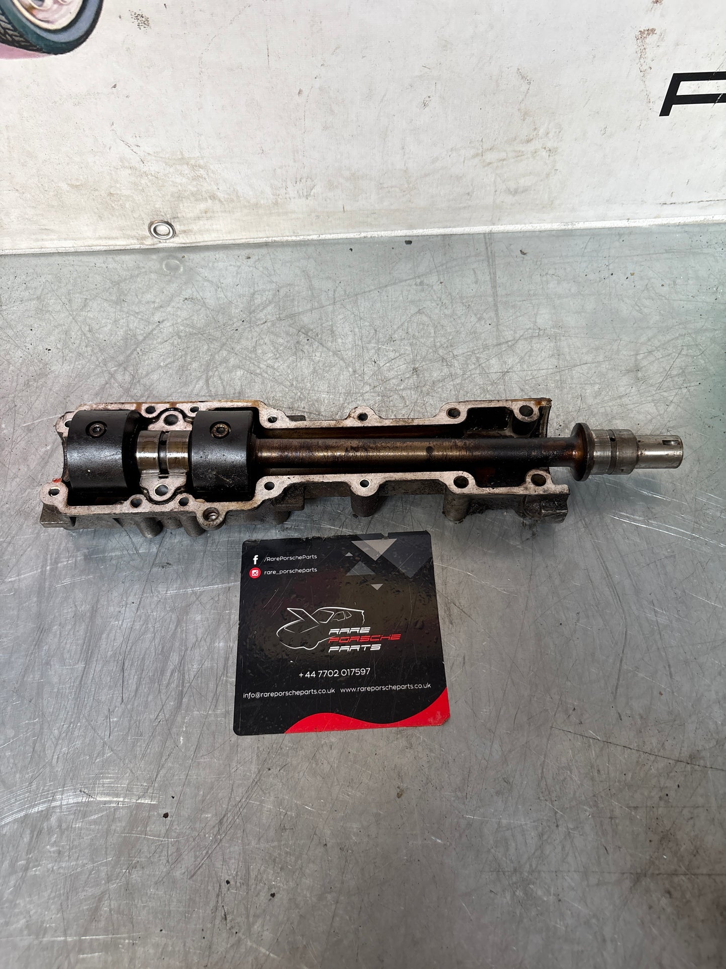 Porsche 924 2.5 / 944 Balance shaft, with housing, used 9441011080R
