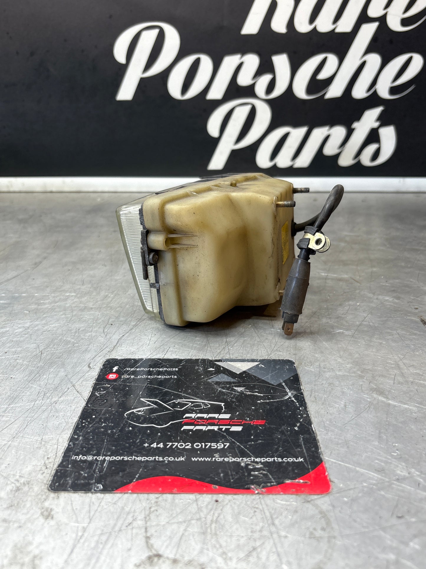 Porsche 928 Bosch headlight high beam, left 0306403001 / 92863141401