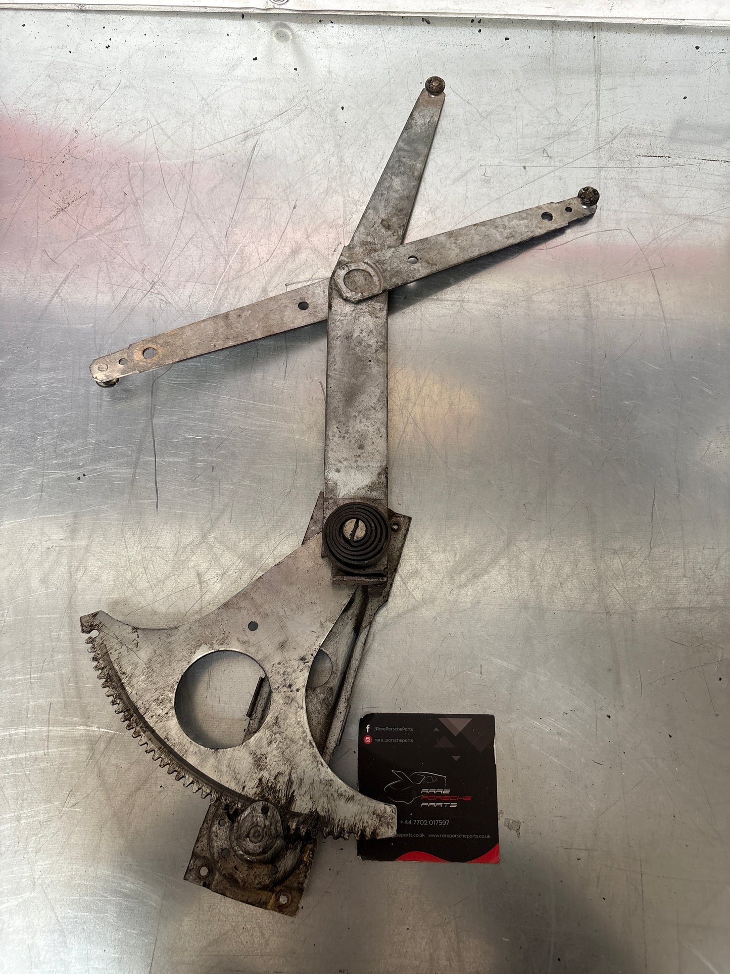 Porsche 924 944 Manual window regulator, used, left 477837441A