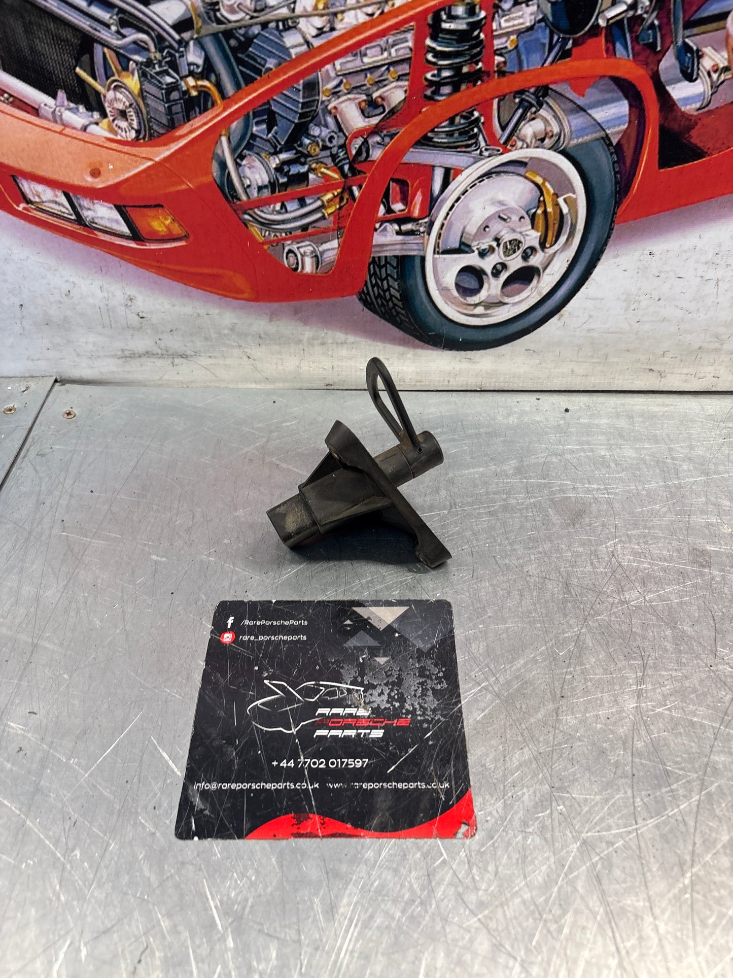 Porsche 968 headlight release frame, used 94475032100