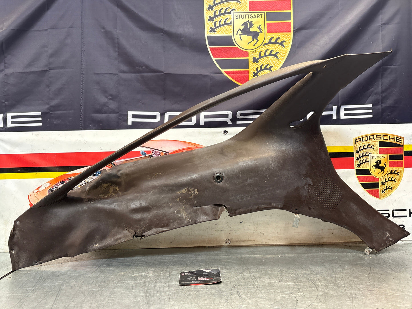 Porsche 928 early left side lower side trim panel, without loudspeaker, burgundy used 92855502102