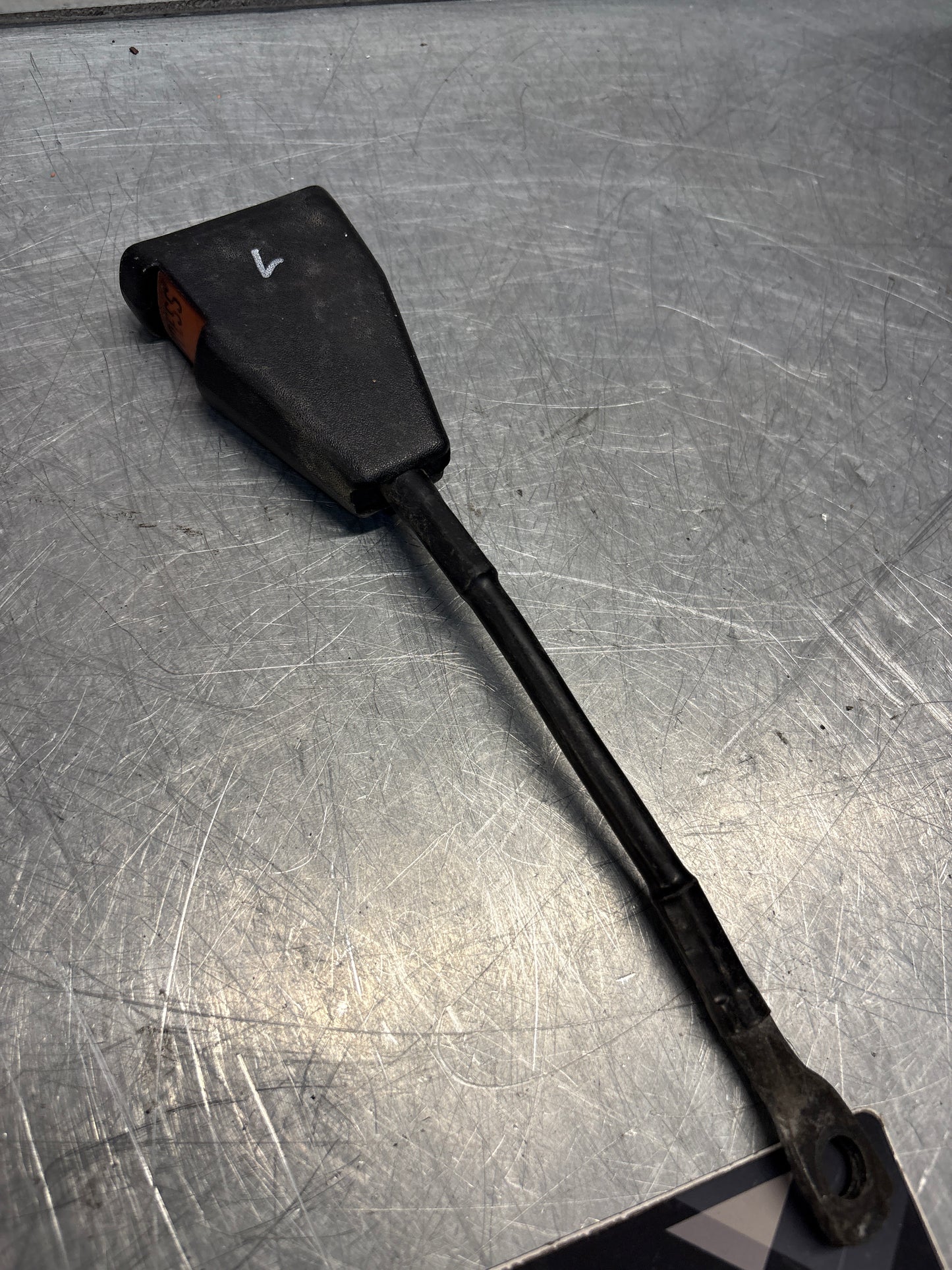 Used Porsche 924 early left seat belt anchor clasp retainer, buckle. 477857755D (used)