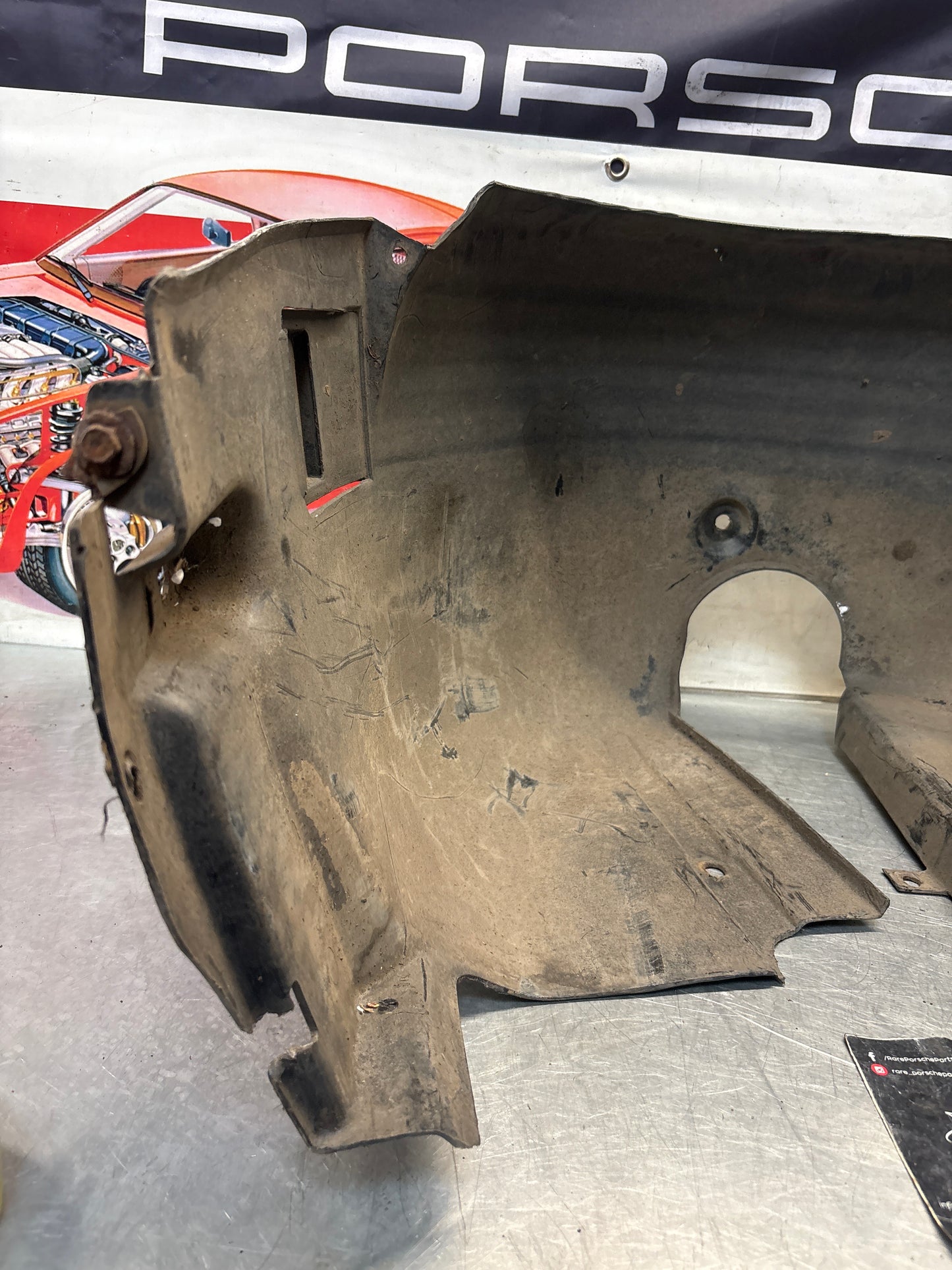 Porsche 944 from 85.5 wheel arch liner  Left, 94450438101 Used