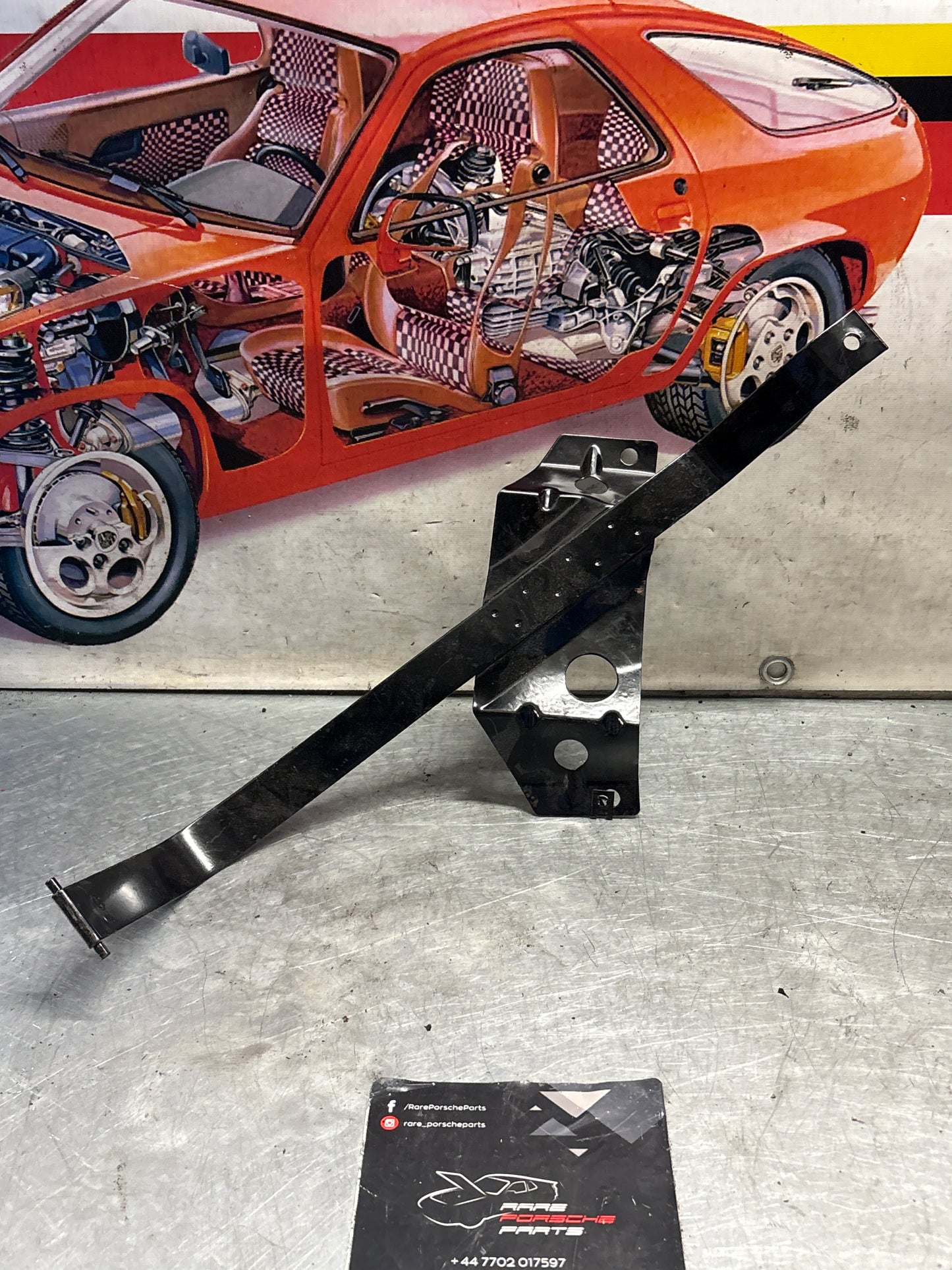 Porsche 944 S2 / Turbo 90- left fuel tank restraining strap, refurbished 95120131502