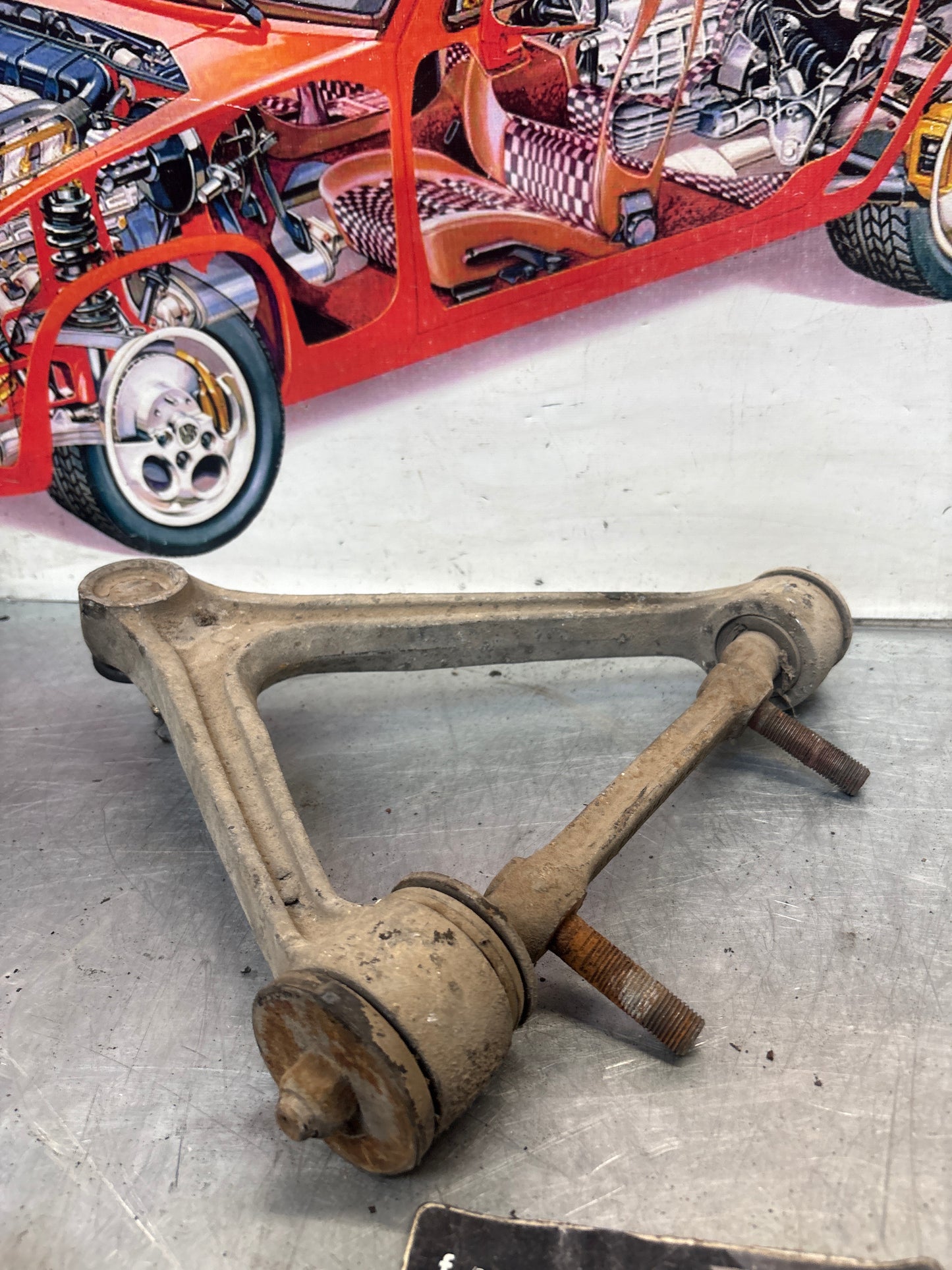 Porsche 928 front upper left control arm, used 92834145722