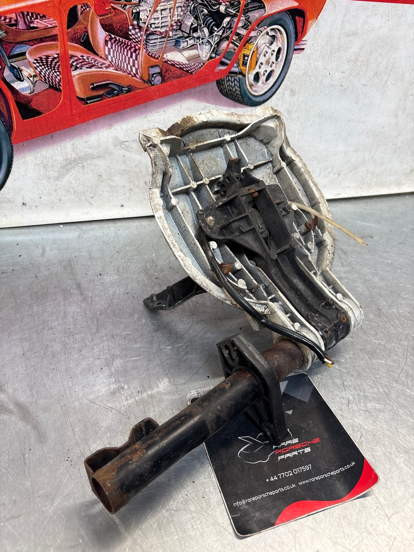 Porsche 928 left headlight swivel frame 92875024902 92875024302 used