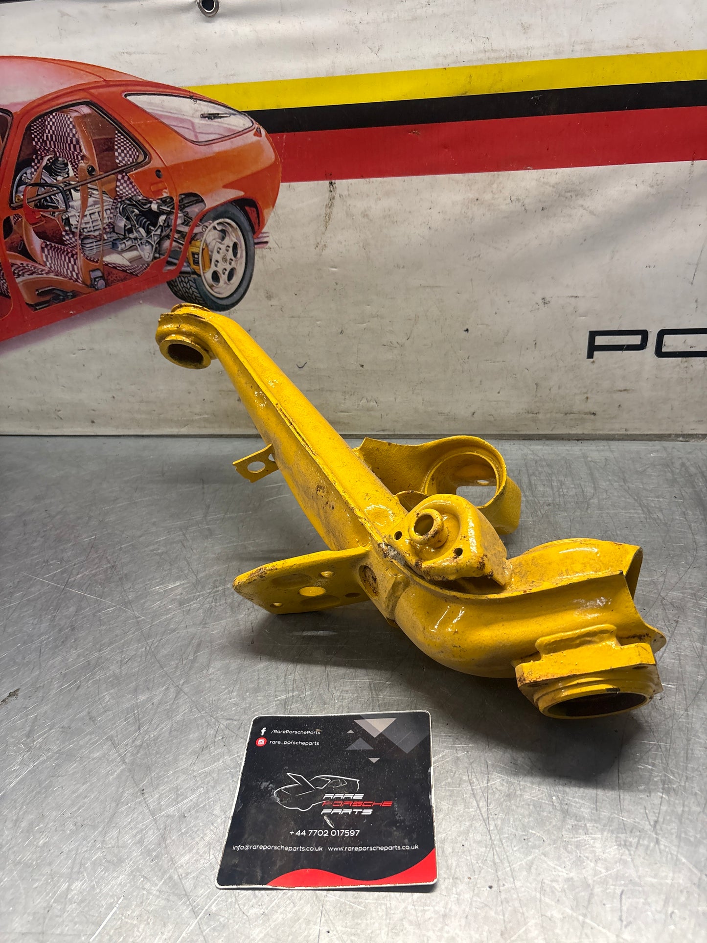Porsche 924 944  -85.5 Rear left trailing arm,  refurbished 94433102100