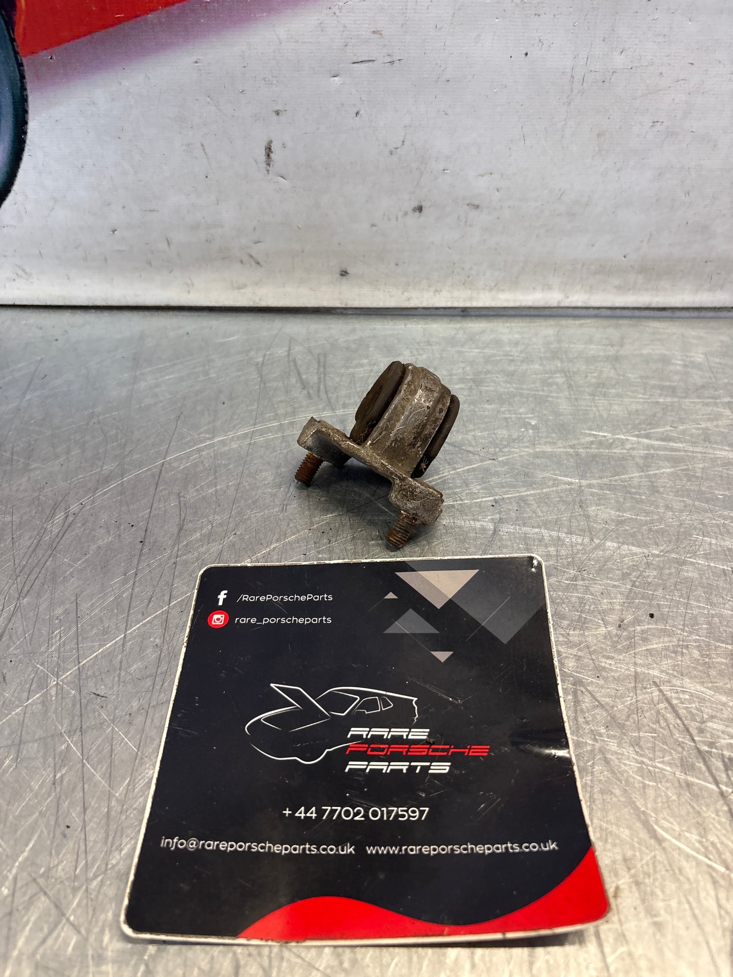 Porsche 924 anti roll bar bearing bracket, left, used 94434373501
