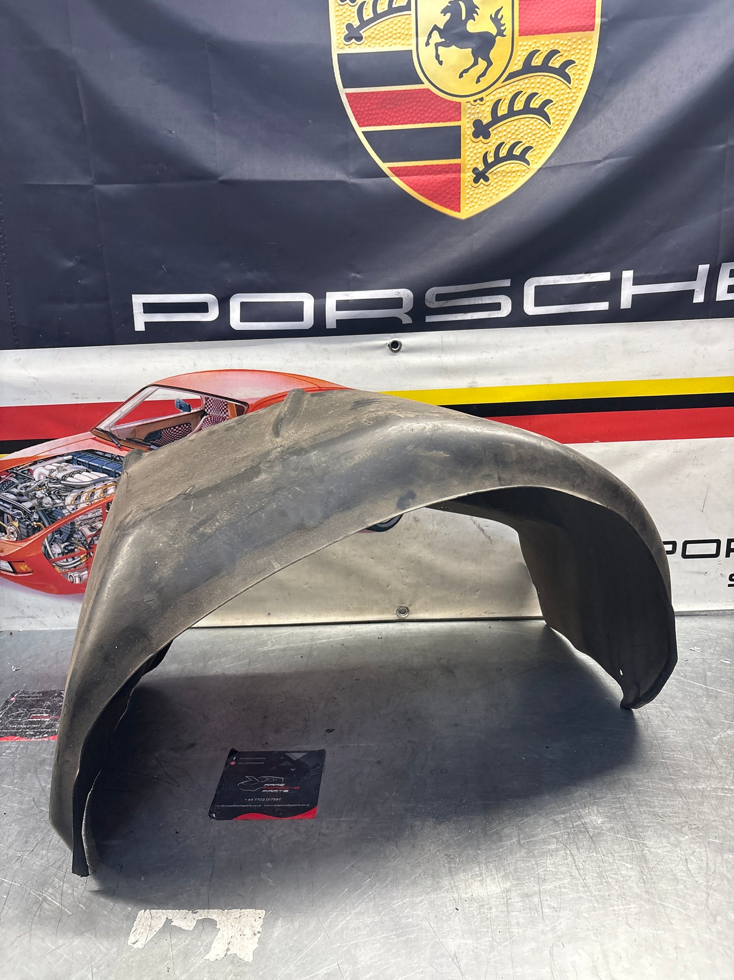 Porsche 928 wheel arch liner  Left 92850438105 Used
