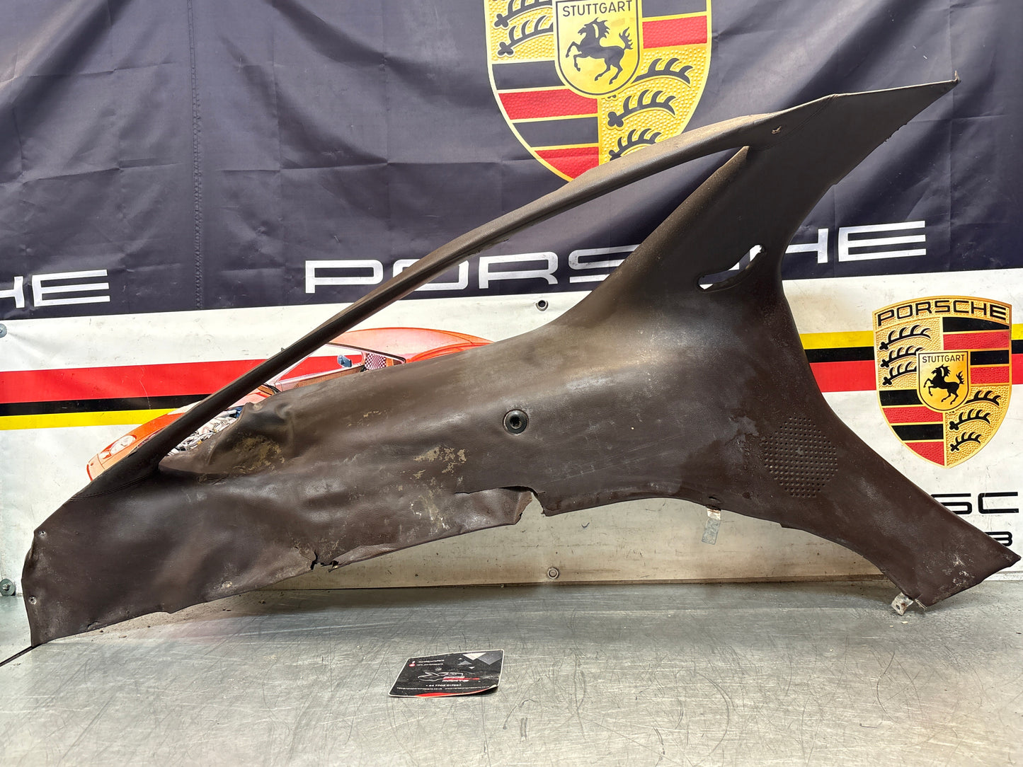Porsche 928 early left side lower side trim panel, without loudspeaker, burgundy used 92855502102