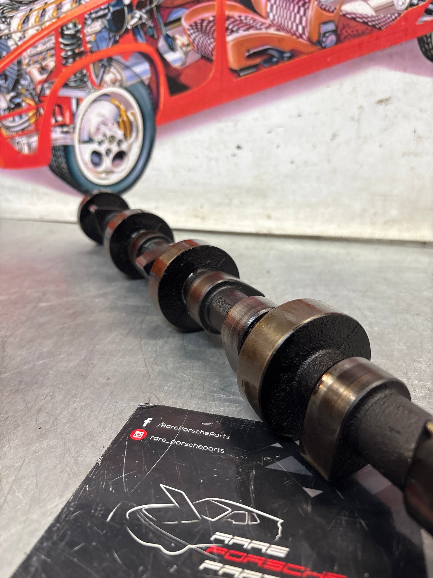 Porsche 928 cam shaft, used 9281052030R