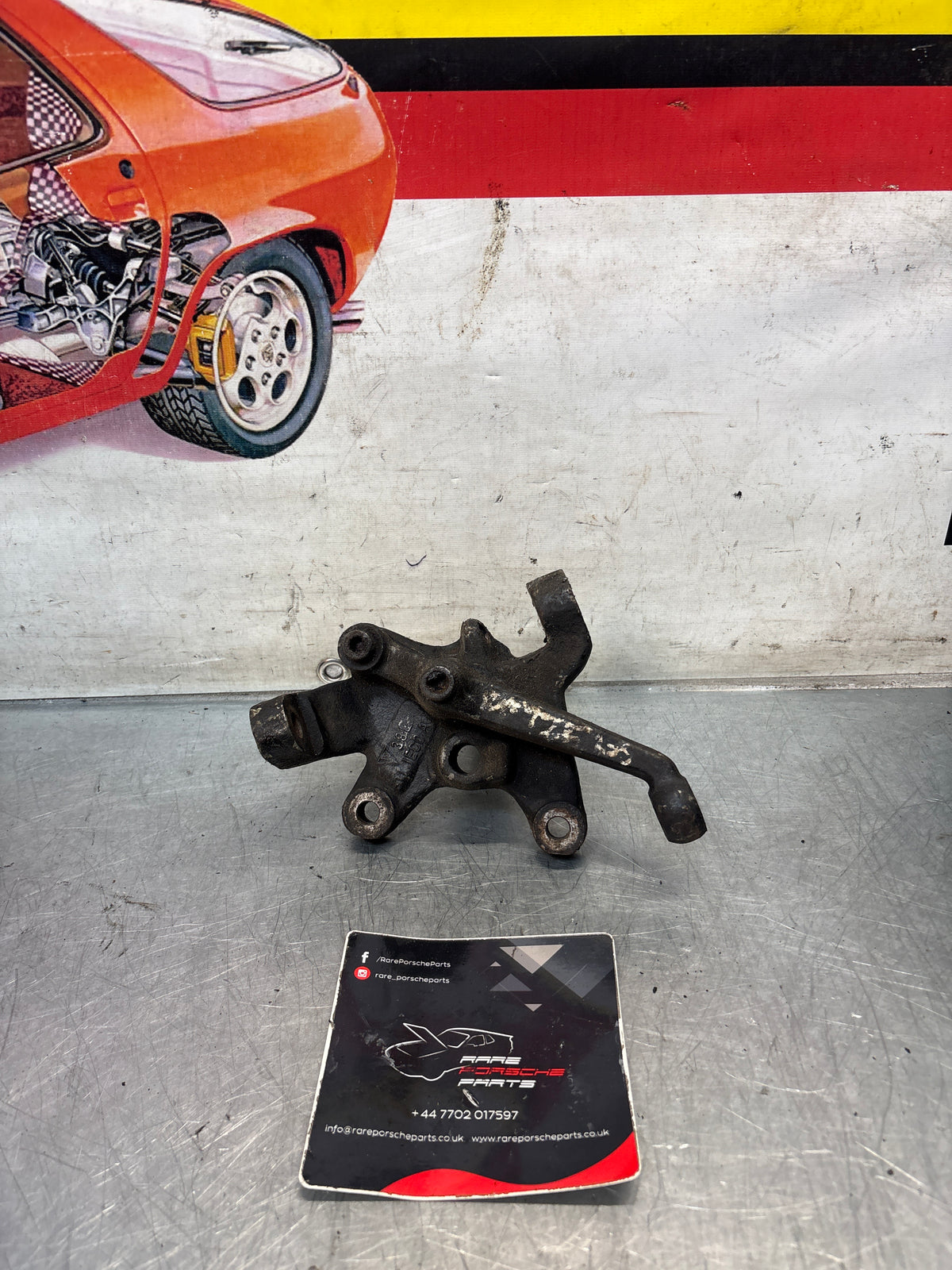 Porsche 928 left steering spindle knuckle, used 92834105713