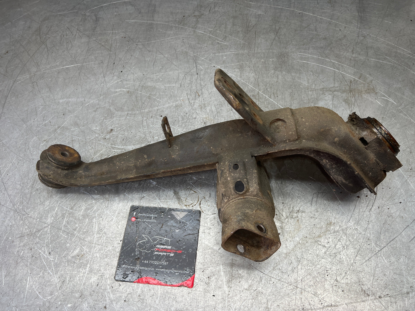 Porsche 924 944  -85.5 Rear left trailing arm, 94433102100