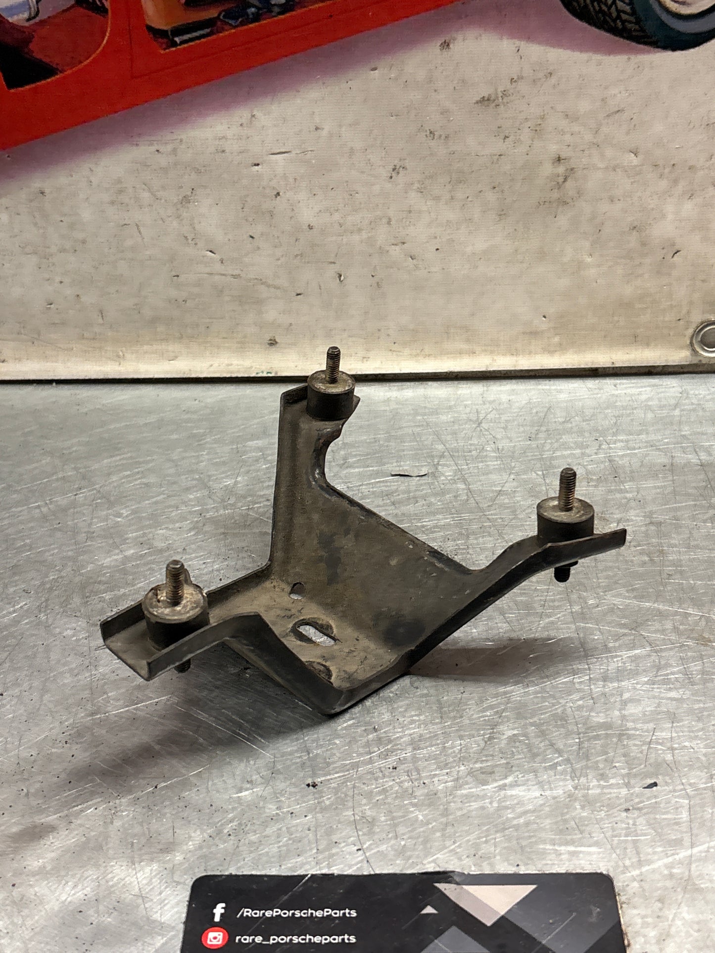 Porsche 924 Turbo air filter housing support bracket 477805513, used