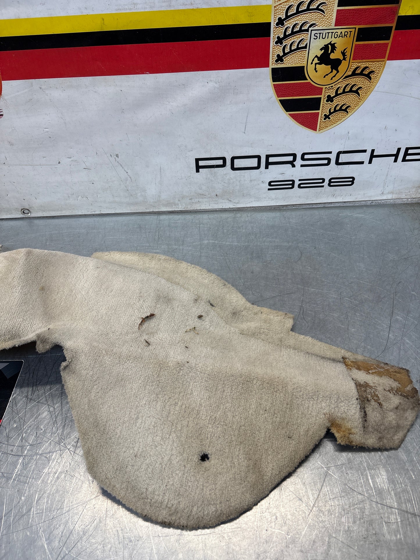 Porsche 924/944 -85.5 rear left side trim carpet, white, 944555083, used