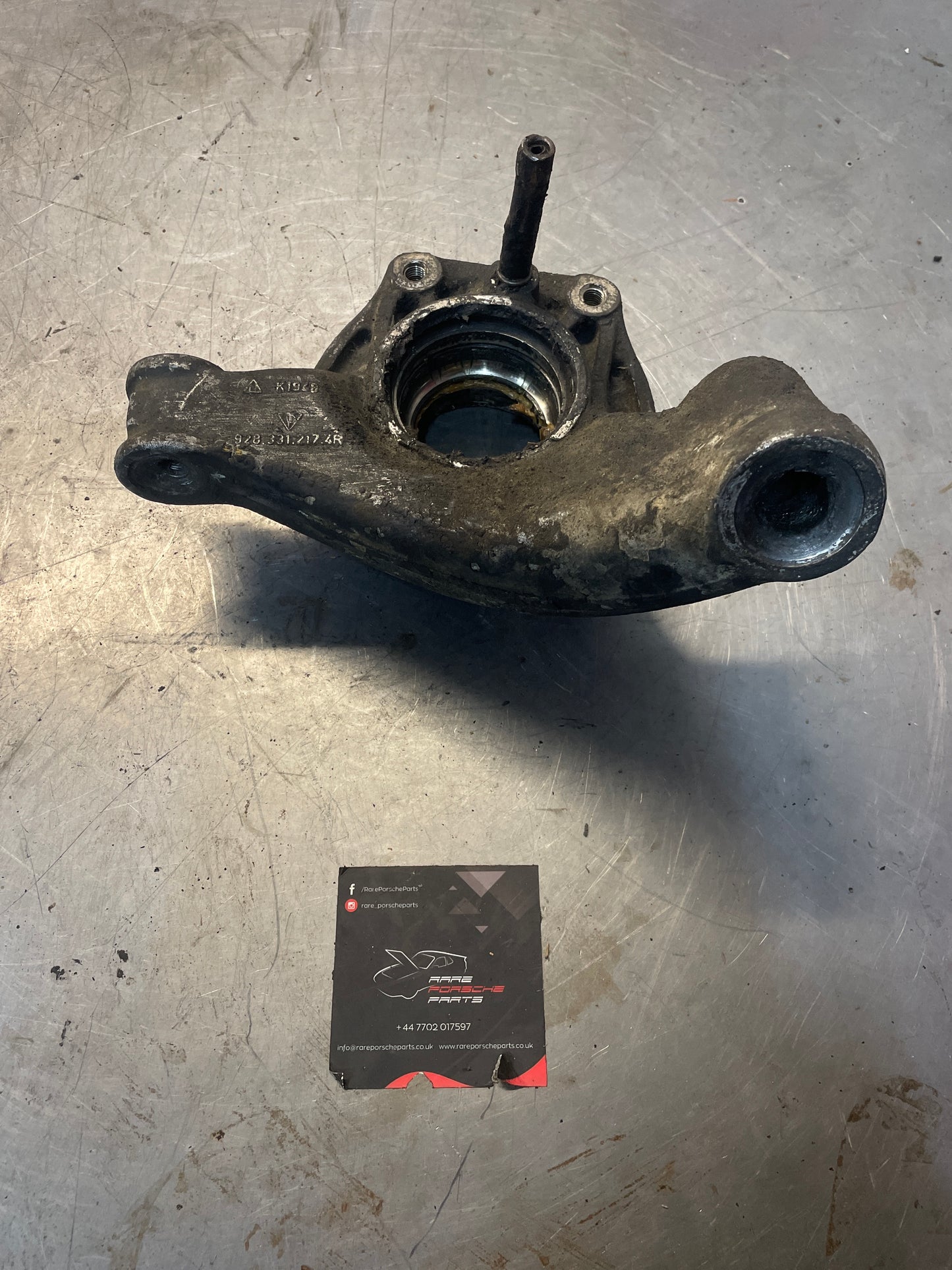 Porsche 928 rear left wheel hub carrier, used 9283312174R