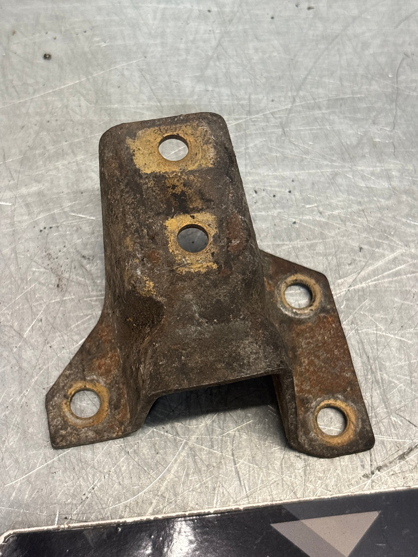 Porsche 924 944 hook trestle bracket, right, used 477399168E