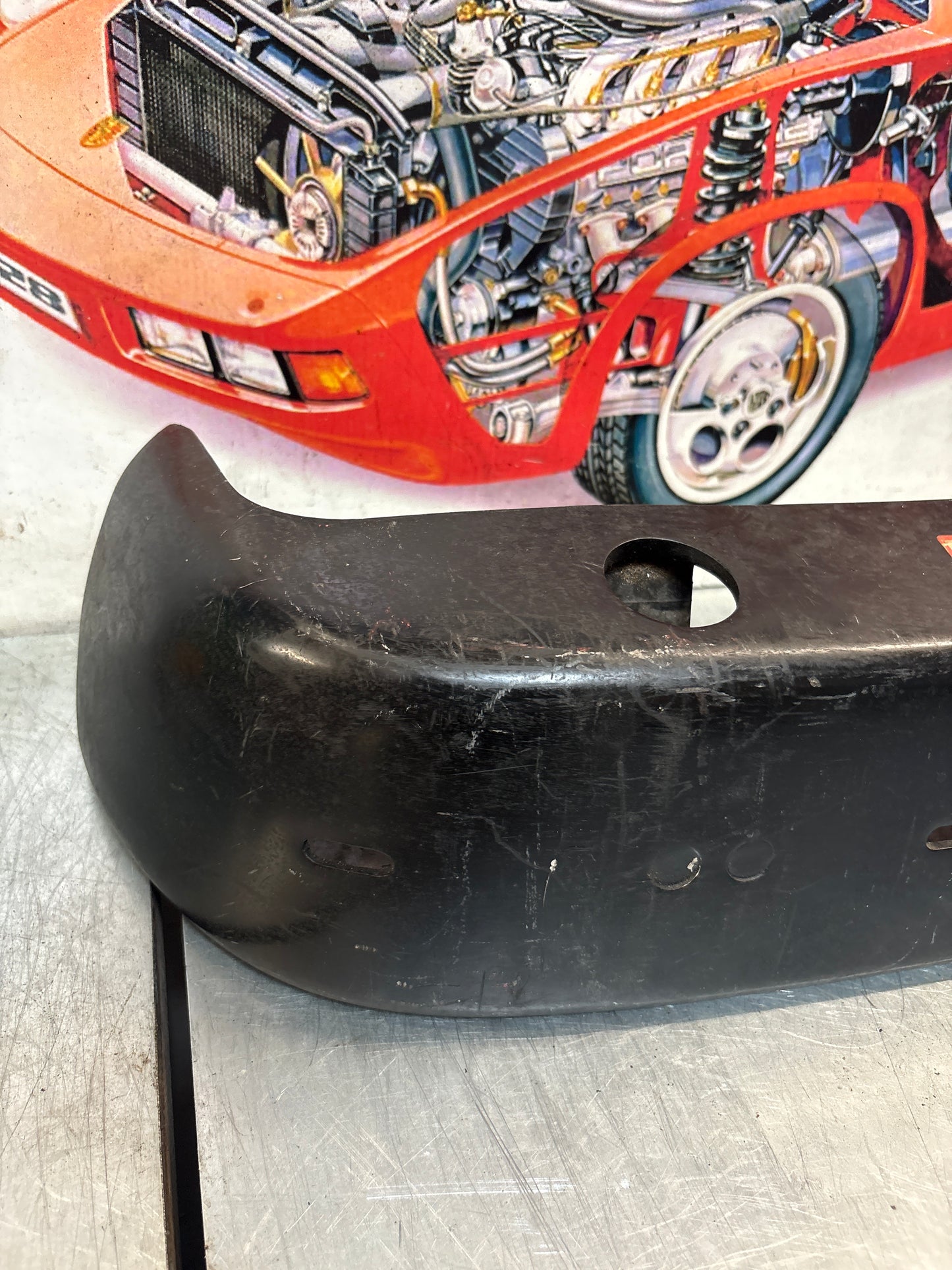 Porsche 924 rear bumper, NOS USA version 477807301A