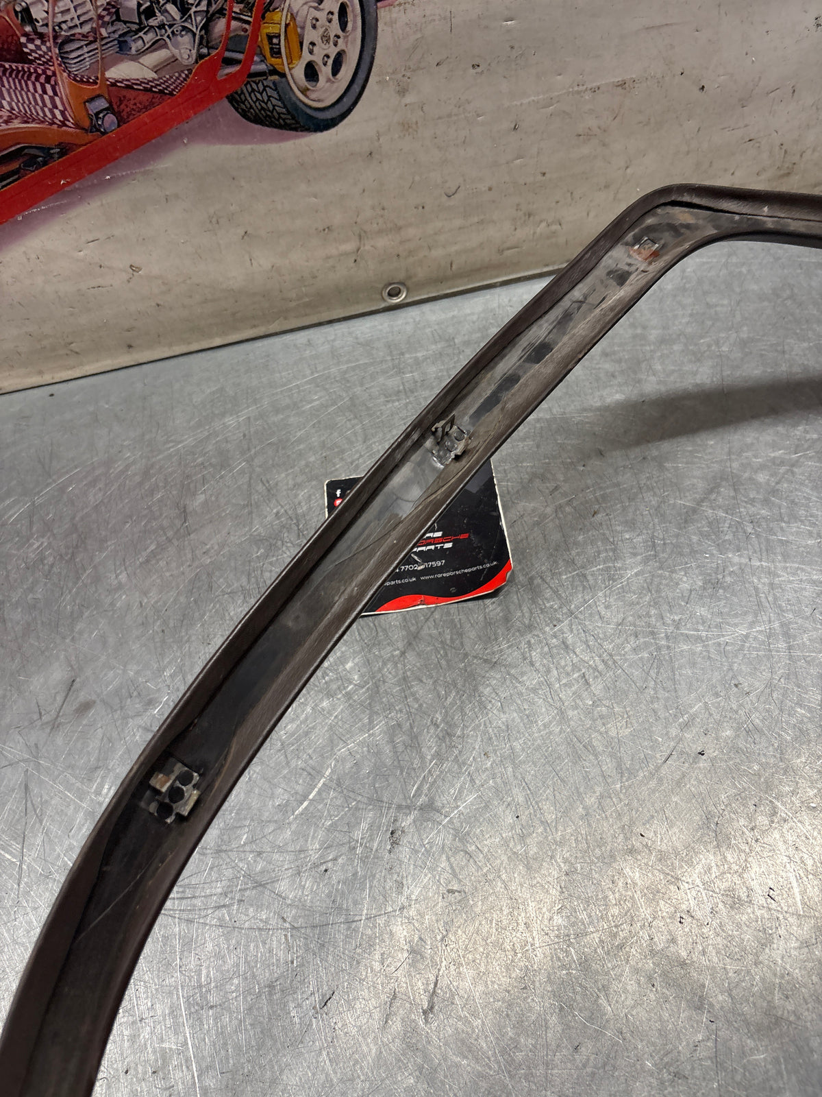 Porsche 928 left, off side door upper frame surround trim, brown 92855502502, used