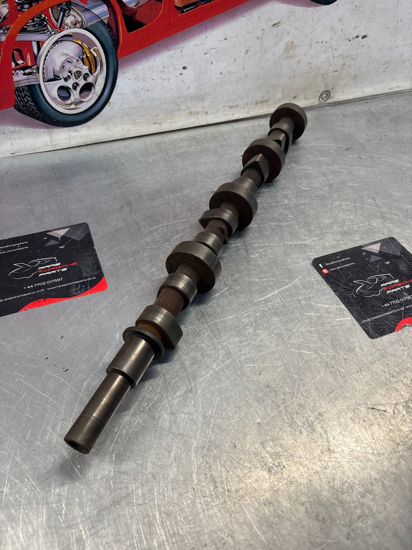 Porsche 928 cam shaft, used 9281052040R