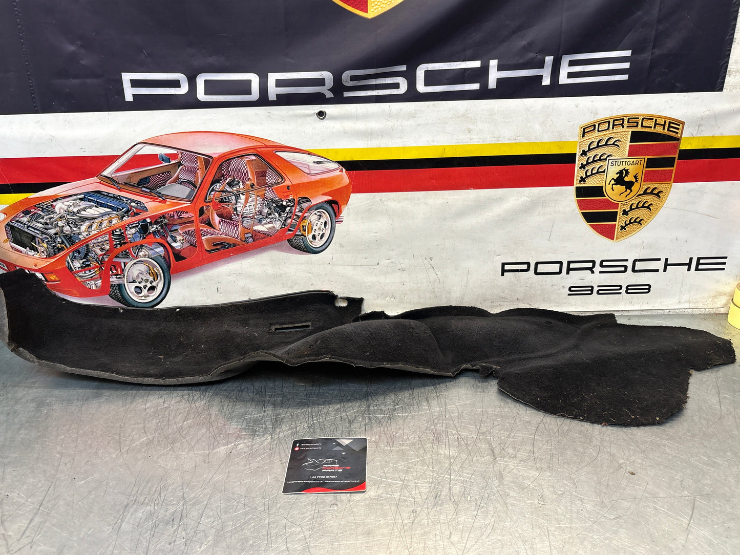 Porsche 924/944 85.5- rear left side trim carpet, black, 94455508301, used