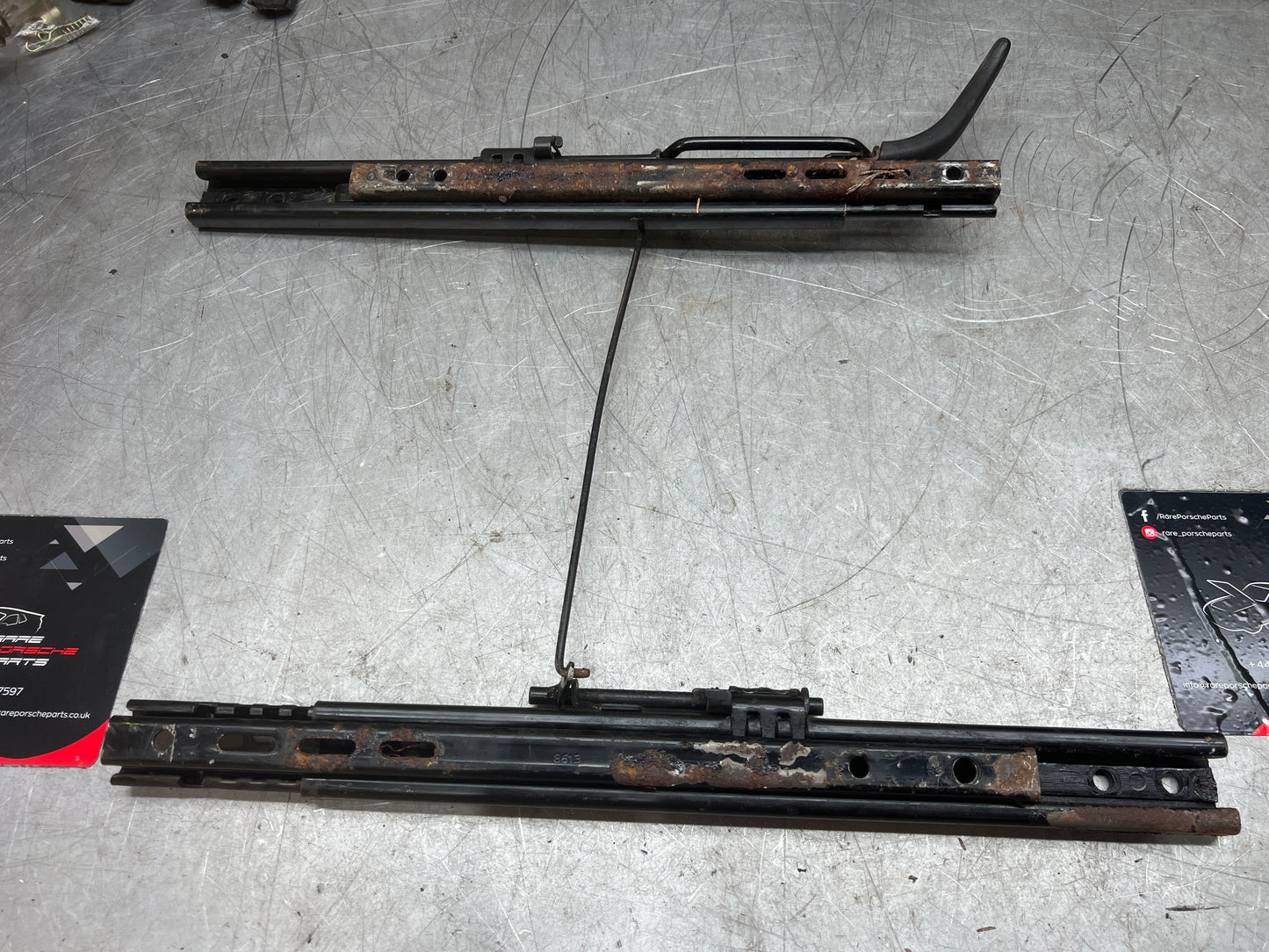 Porsche 944/968 pair of late type seat runners, manual, left side, used