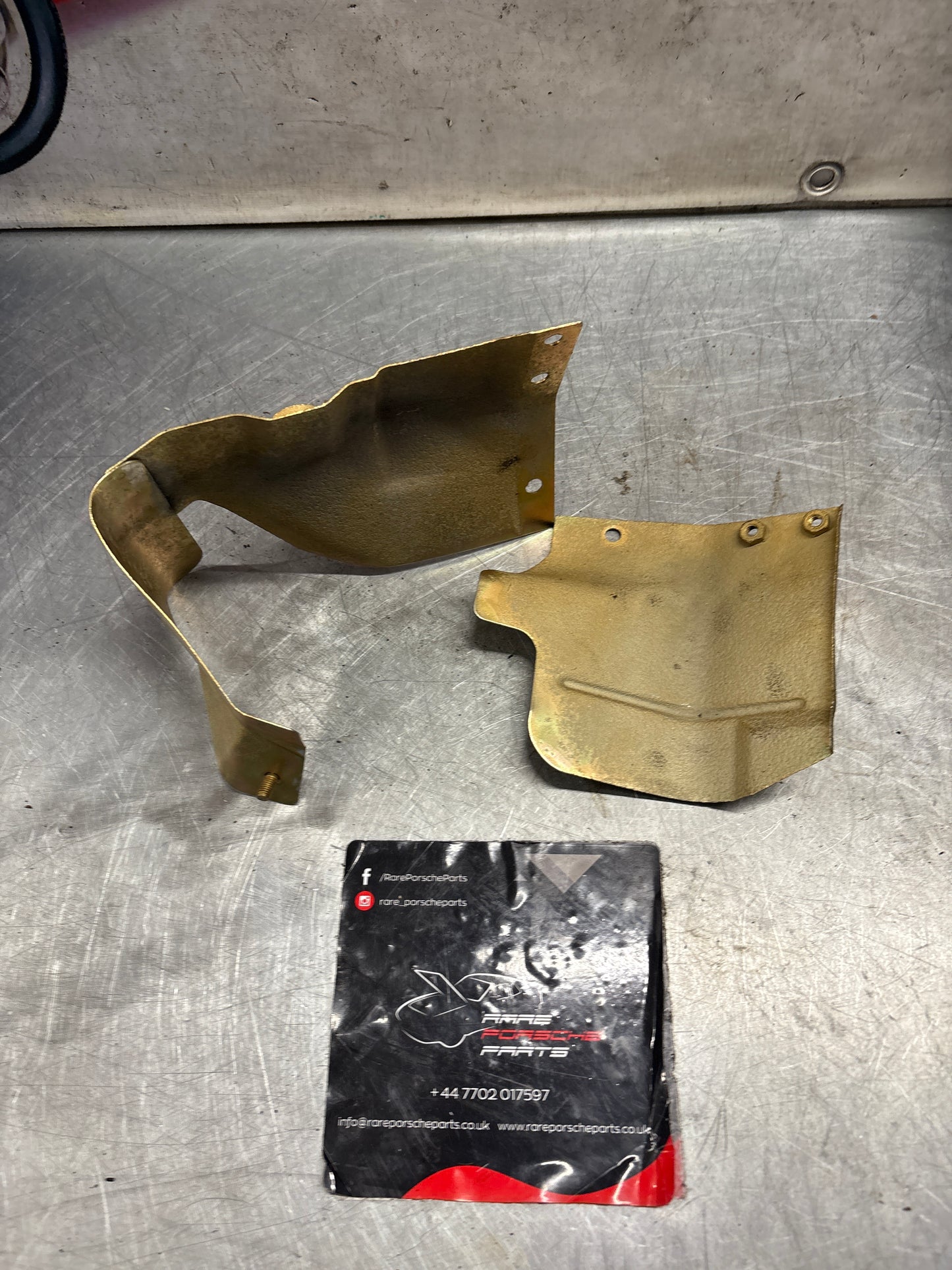 Porsche 944 Turbo oil cooler heat shield, used 95110705301