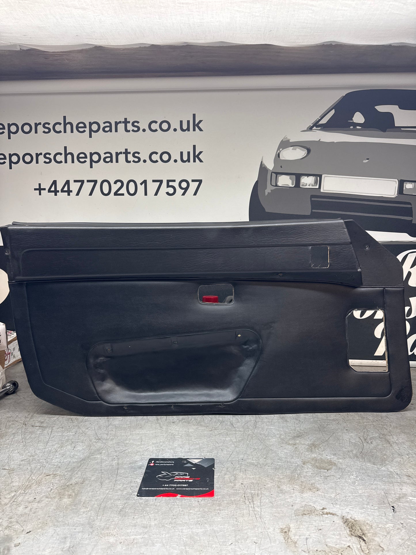 Porsche 924/ Early 944 black RHD Left door card. Fibreglass repaired. 477867012