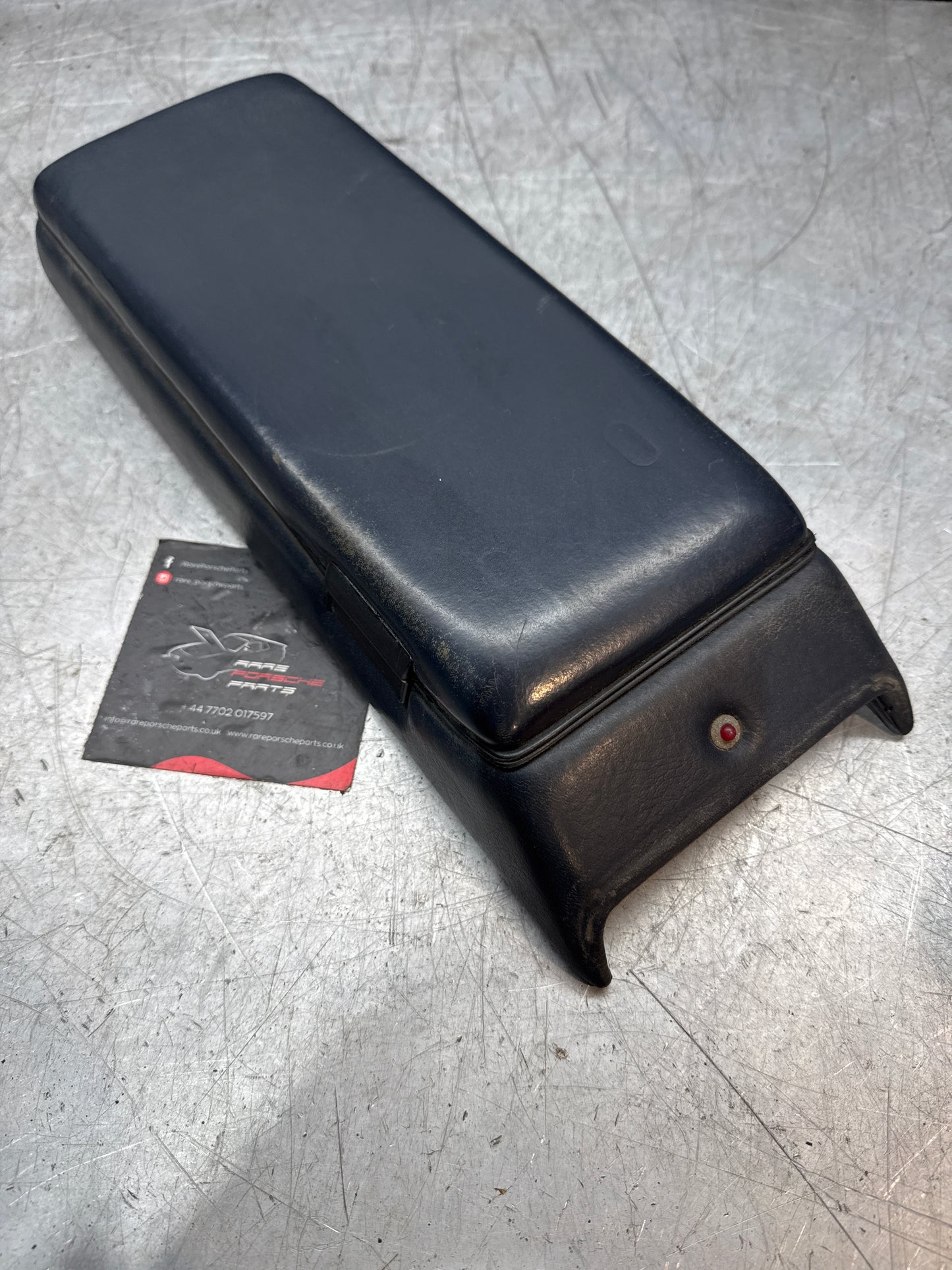 Porsche 928 92755572903 Central armrest cassette compartment black, used RHD