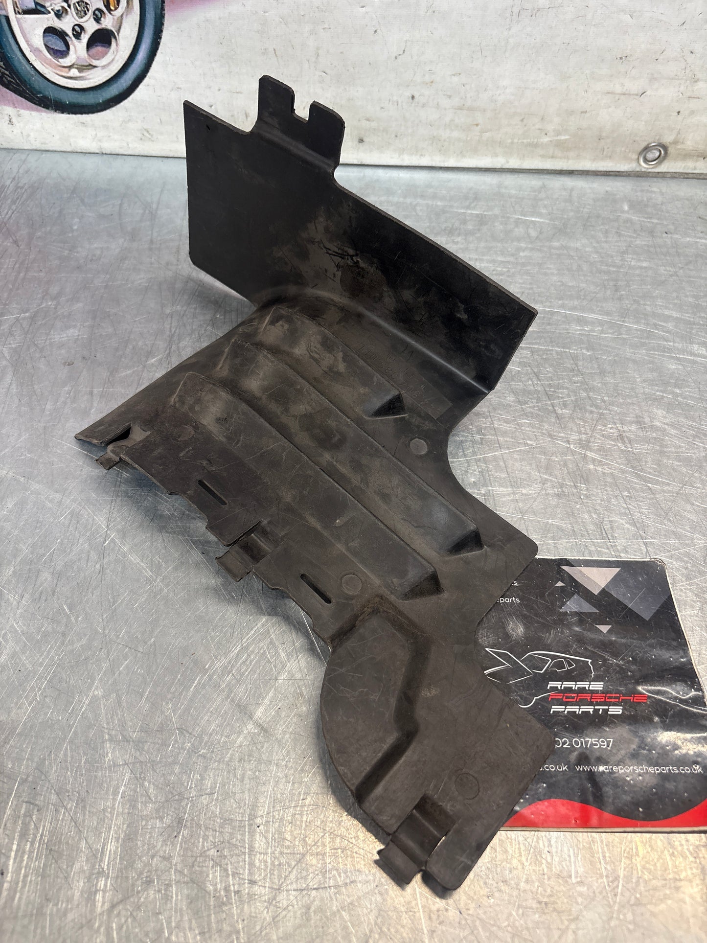 Porsche 968 left front wheel housing extension, genuine 94450438501