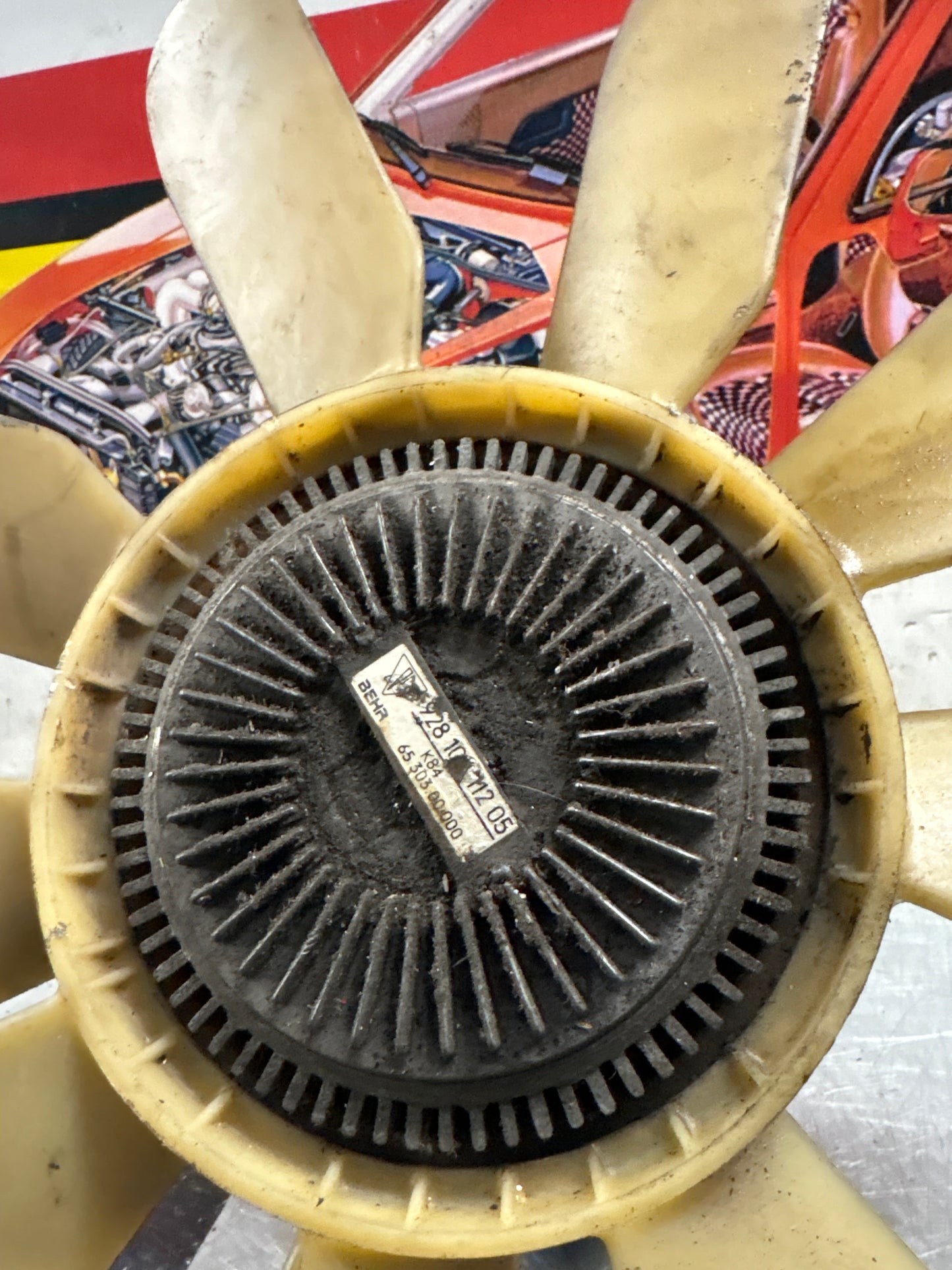 Porsche 928 late engine cooling fan clutch with bracket, used 92810611205 / 92810613701 / 9281061104R