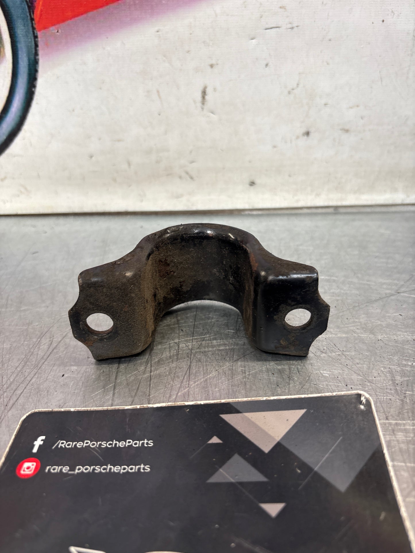 Porsche 928 front anti roll bar clamp, 92834377700 used