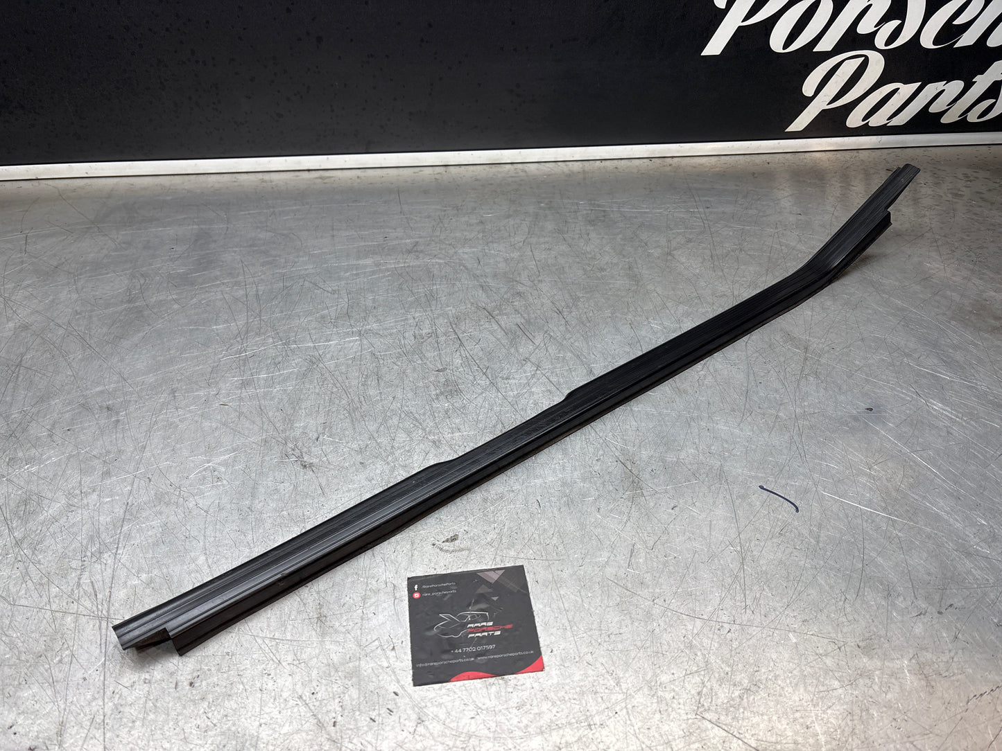 Porsche 944 85.5- left sill trim, scuff plate used 94455112100 cracked
