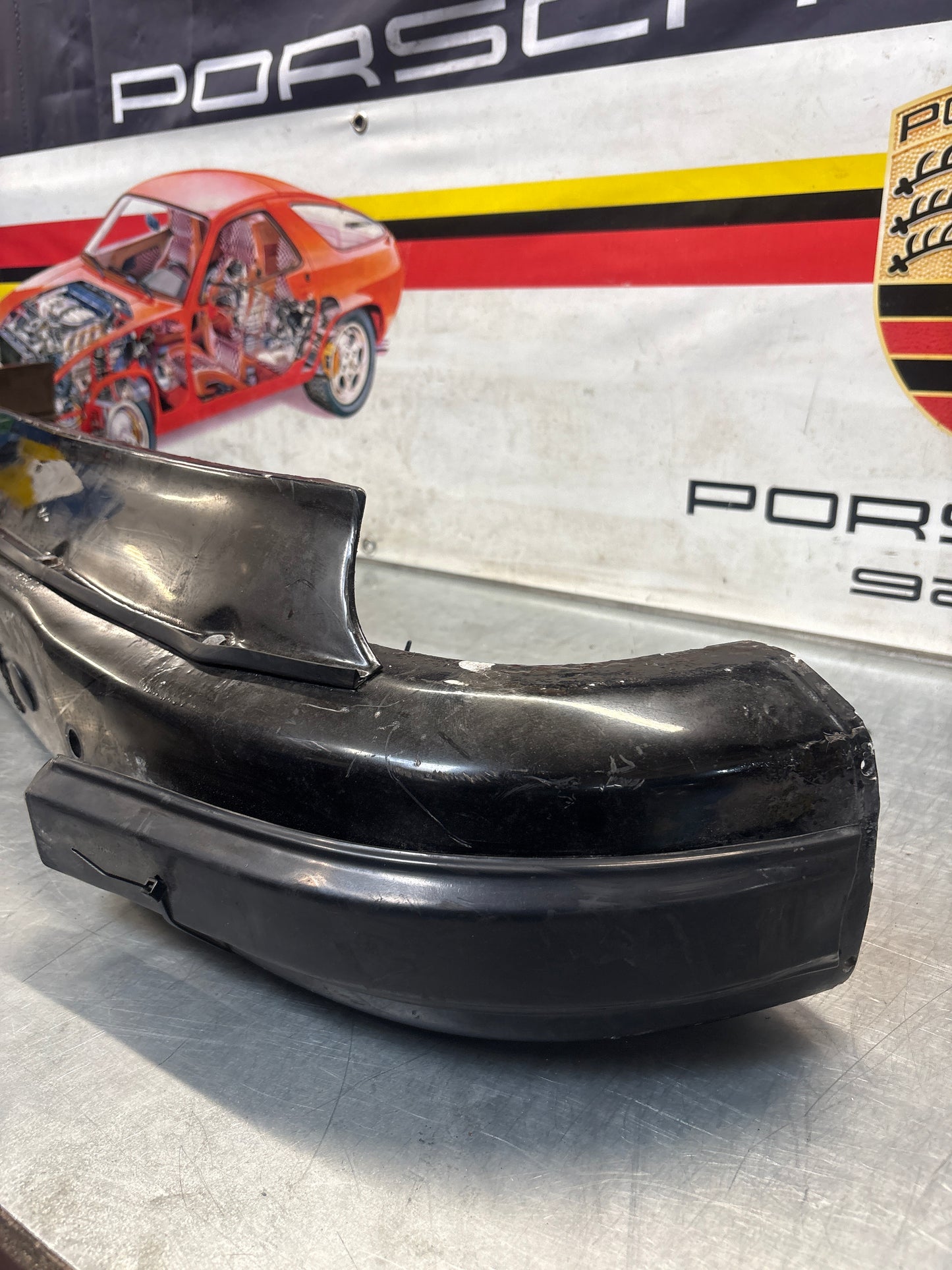 Porsche 911 930 rear bumper with skirt, used 93050511201