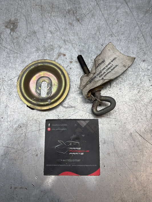 Porsche 924/944 spare wheel retaining plate & long bolt, with genuine label on it