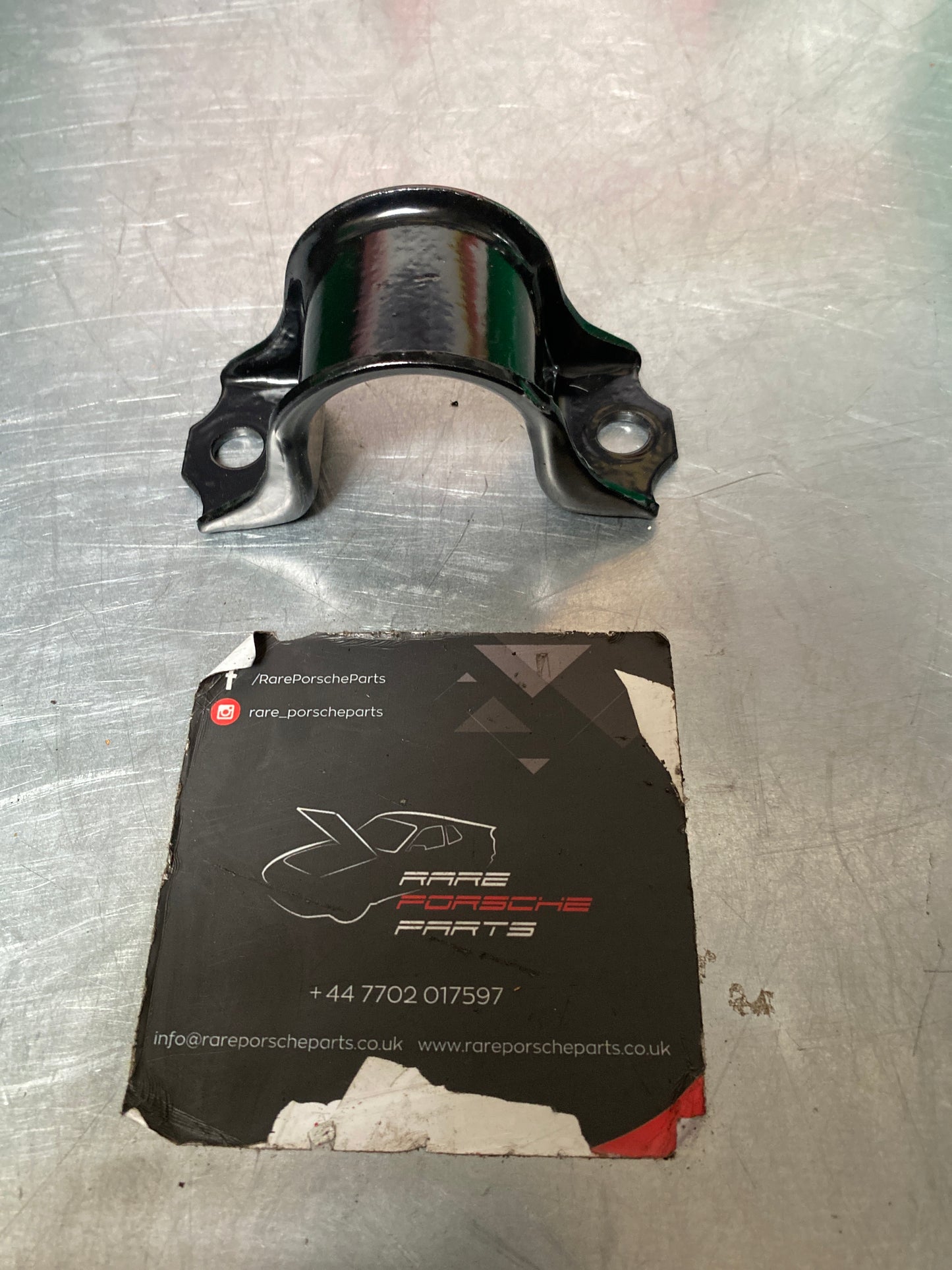 Porsche 928 front anti roll bar clamp, 92834377700 used