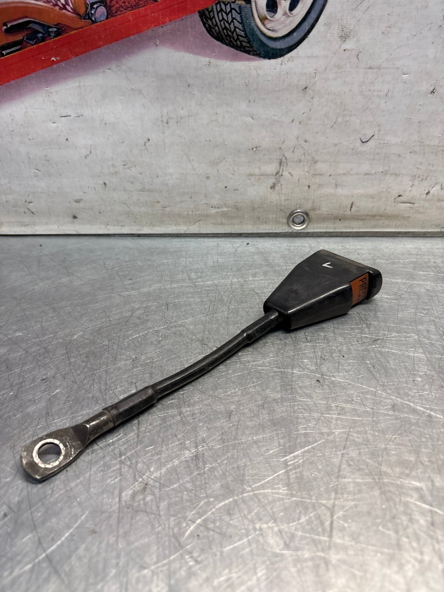 Used Porsche 924 early left seat belt anchor clasp retainer, buckle. 477857755D (used)