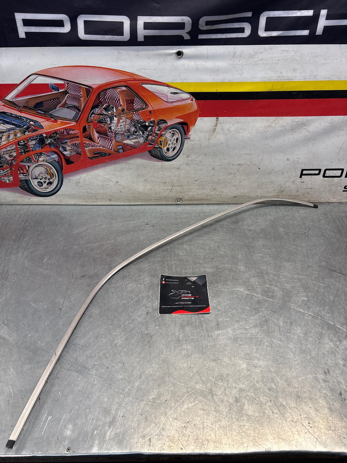 Porsche 928 rear left quarter glass cover strip, used 92854341708