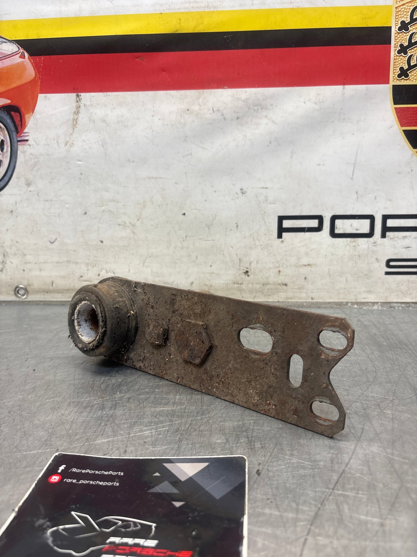 Porsche 924 / 944 left trailing arm, used 477511201