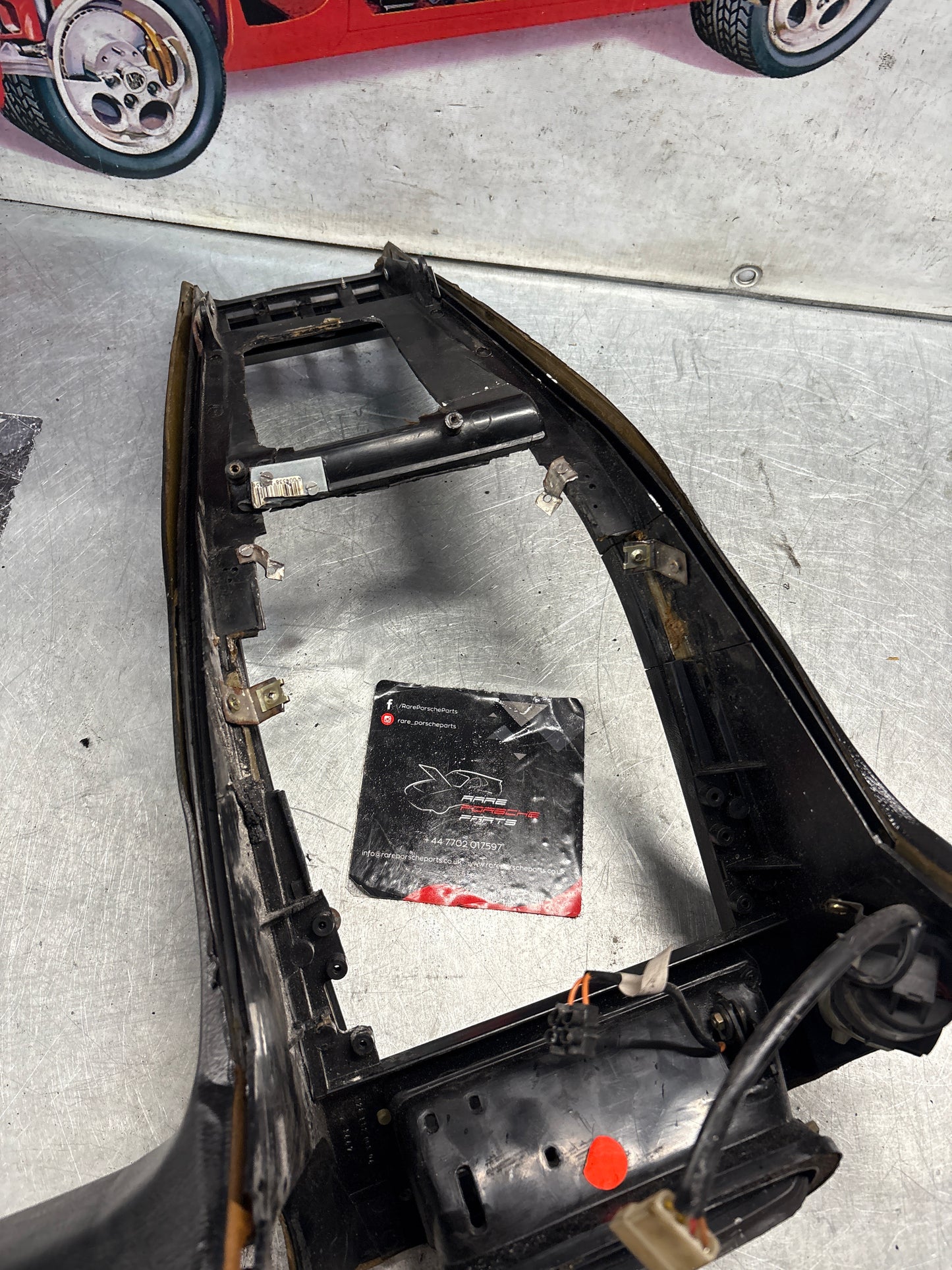 Porsche 928 Center console, used for spares or repair 92855206304 black