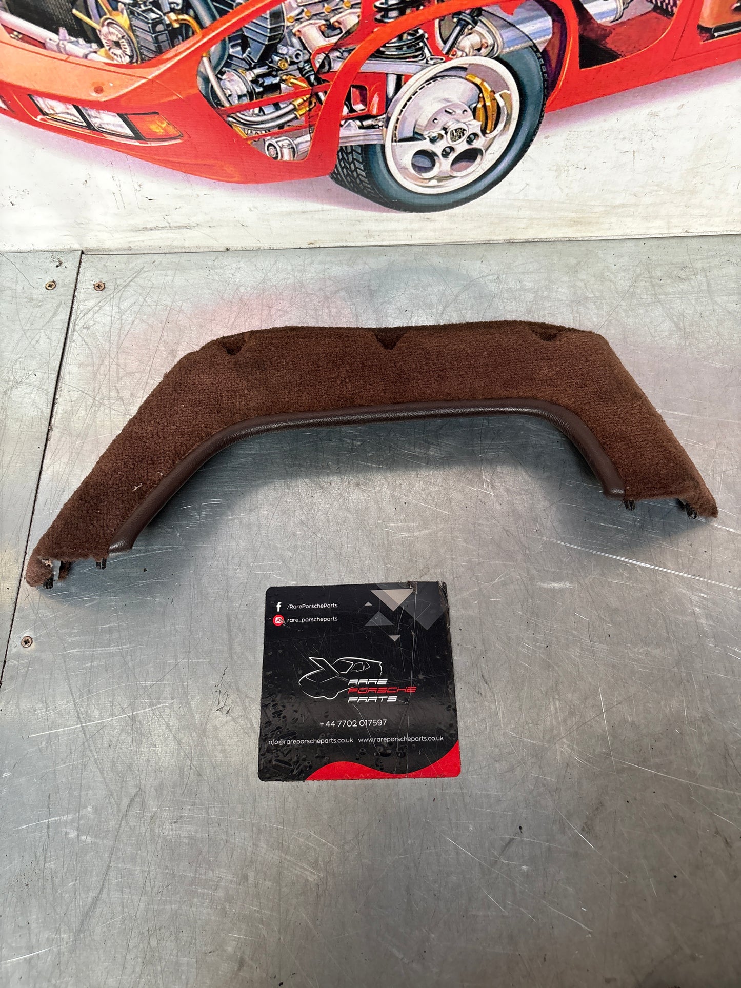 924/944 Left, Passenger side brown carpeted door pocket, used 477867133