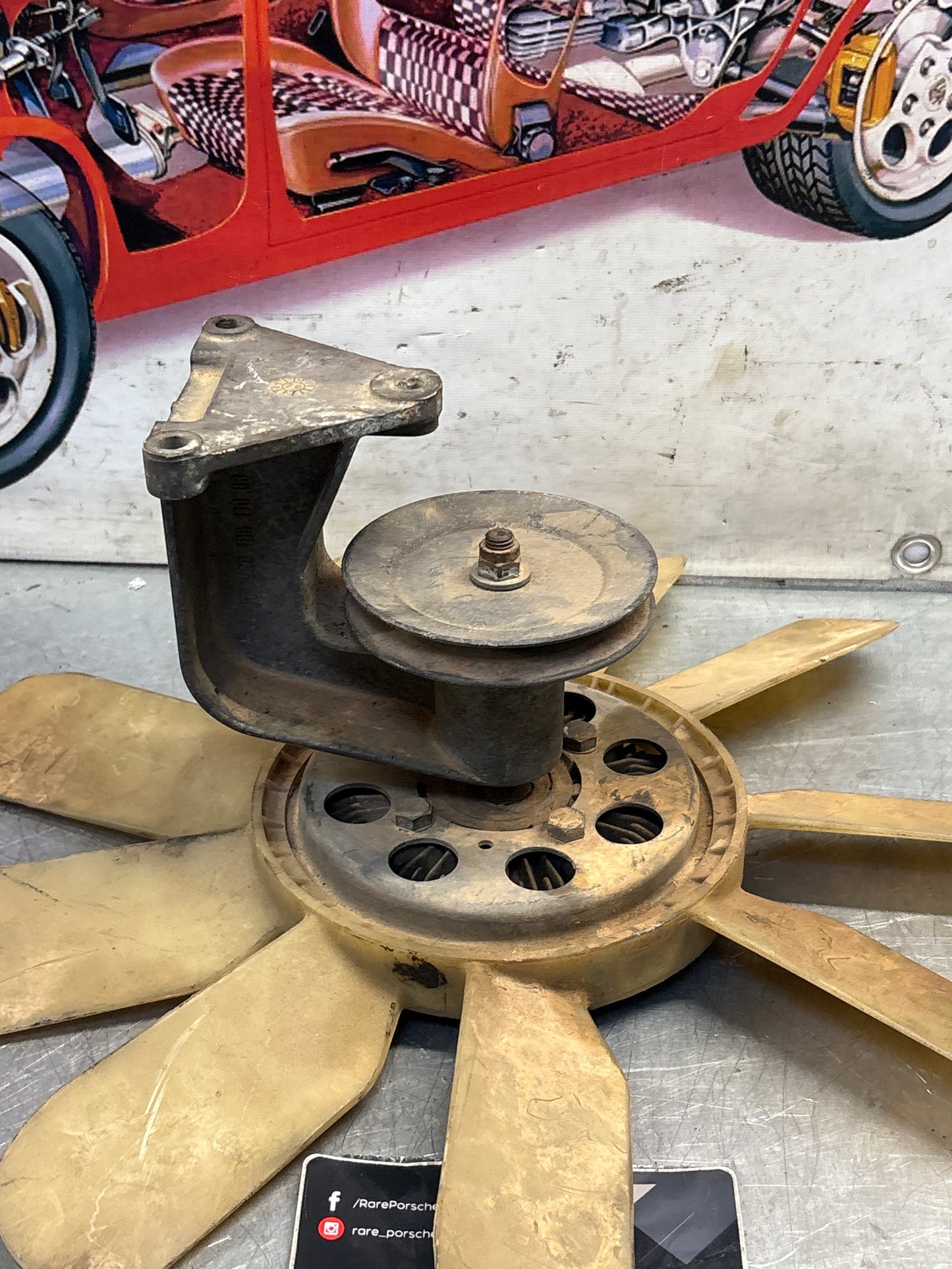 Porsche 928 late engine cooling fan clutch with bracket, used 92810611205 / 92810613701 / 9281061104R