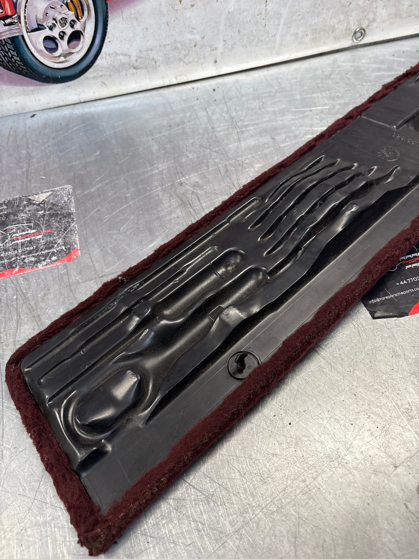 Porsche 928 burgundy carpeted Tool kit panel cover, used 92855118105