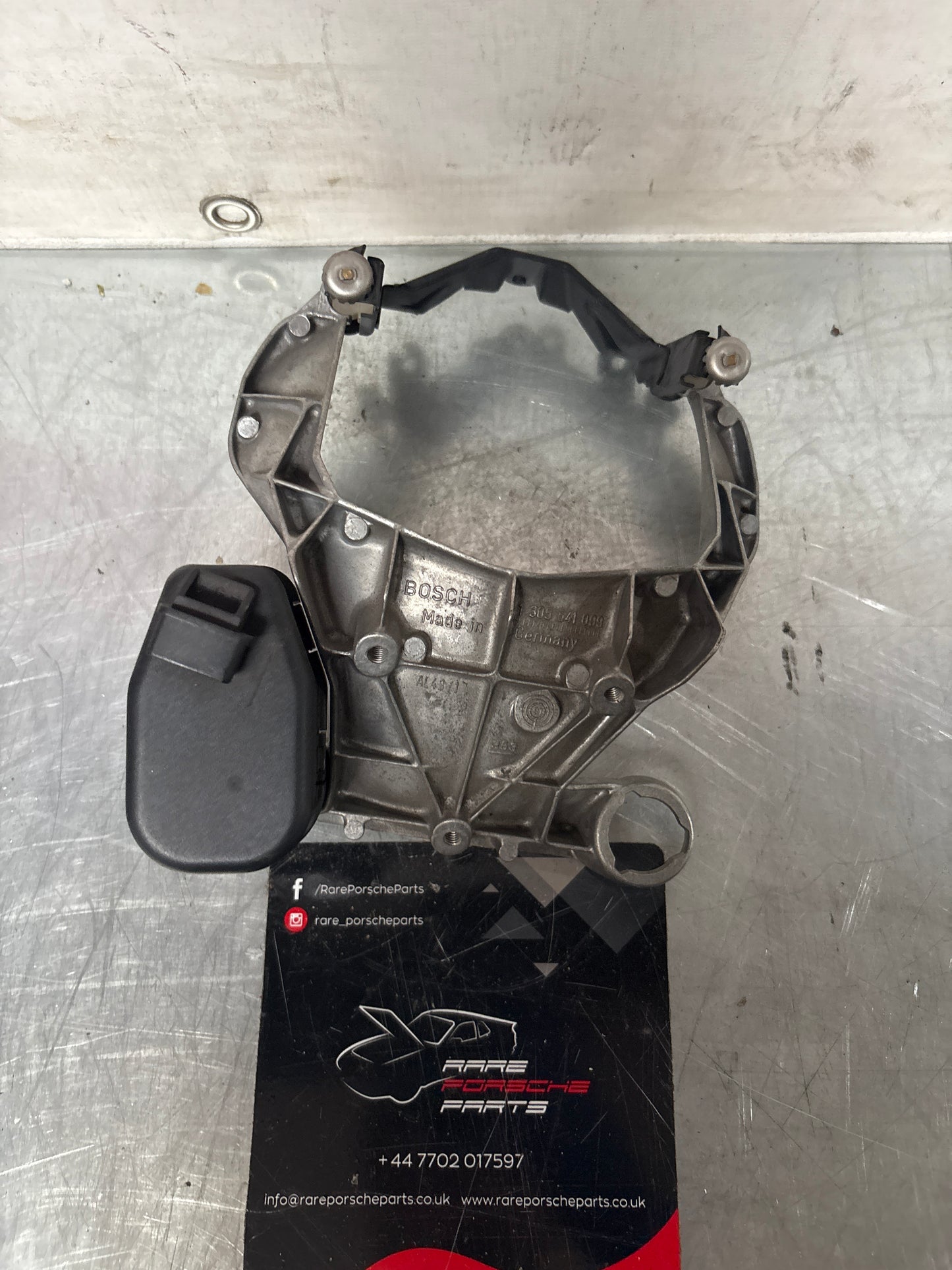 Porsche 968 headlight bracket housing, left 1305541099